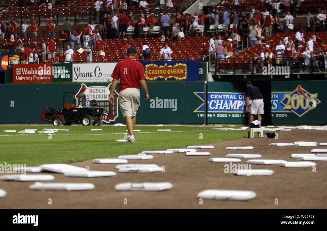 https://c8.alamy.com/comp/W06758/busch-stadium-field-crews-work-to-pick-up-thousands-of-plastic-seat-cushions-that-have-been-thrown-onto-the-field-after-the-st-louis-cardinals-defeated-the-cleveland-indians-5-4-in-the-ninth-inning-on-seat-cushion-give-a-way-night-in-st-louis-on-june-28-2006-upi-photobill-greenblatt-W06758.jpg