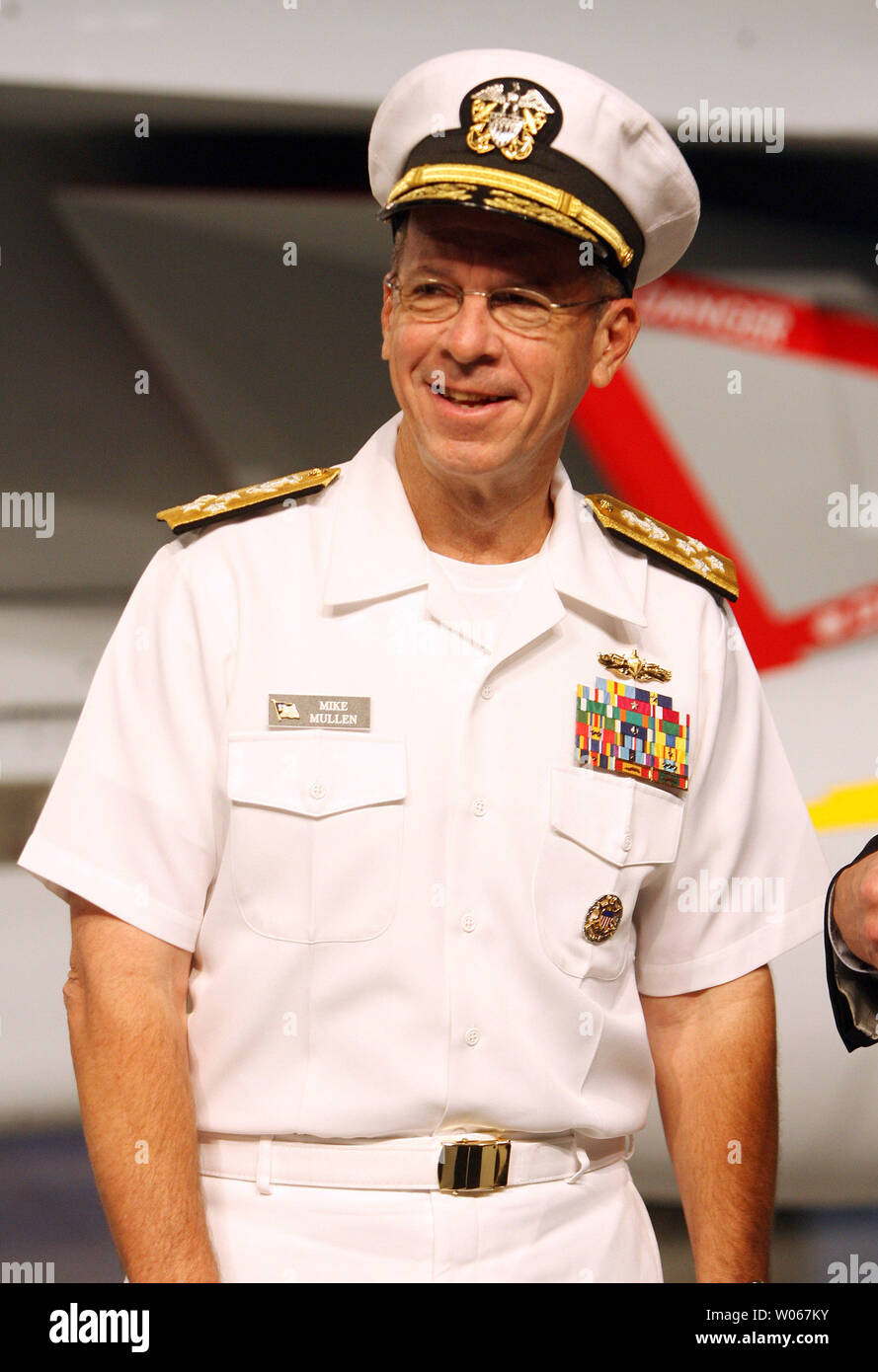 Admiral Michael Mullen, Chief of Naval Operations for the United States Navy, arrives for the ceremonial rollout of the new EA-18G Growler airborne electronic aircraft, at the  Boeing aircraft assembly plant in St. Louis on August 3, 2006. The plane is a two-seat F/A-18F Super Hornet with an advanced weapons, sensors and communications systems. (UPI Photo/Bill Greenblatt) Stock Photo