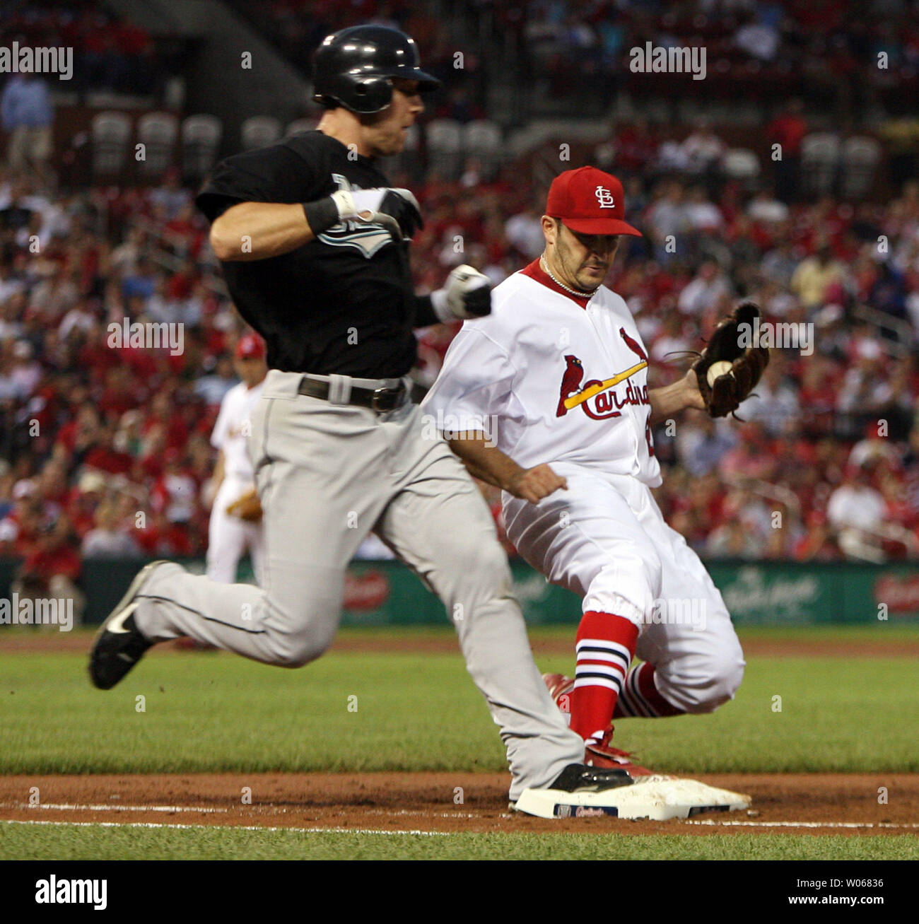 St. Louis Cardinals Albert Pujols swings as he hits a solo home run in the  seventh inning against the Milwaukee Brewers at Busch Stadium in St. Louis  on July 1, 2010. UPI/Bill