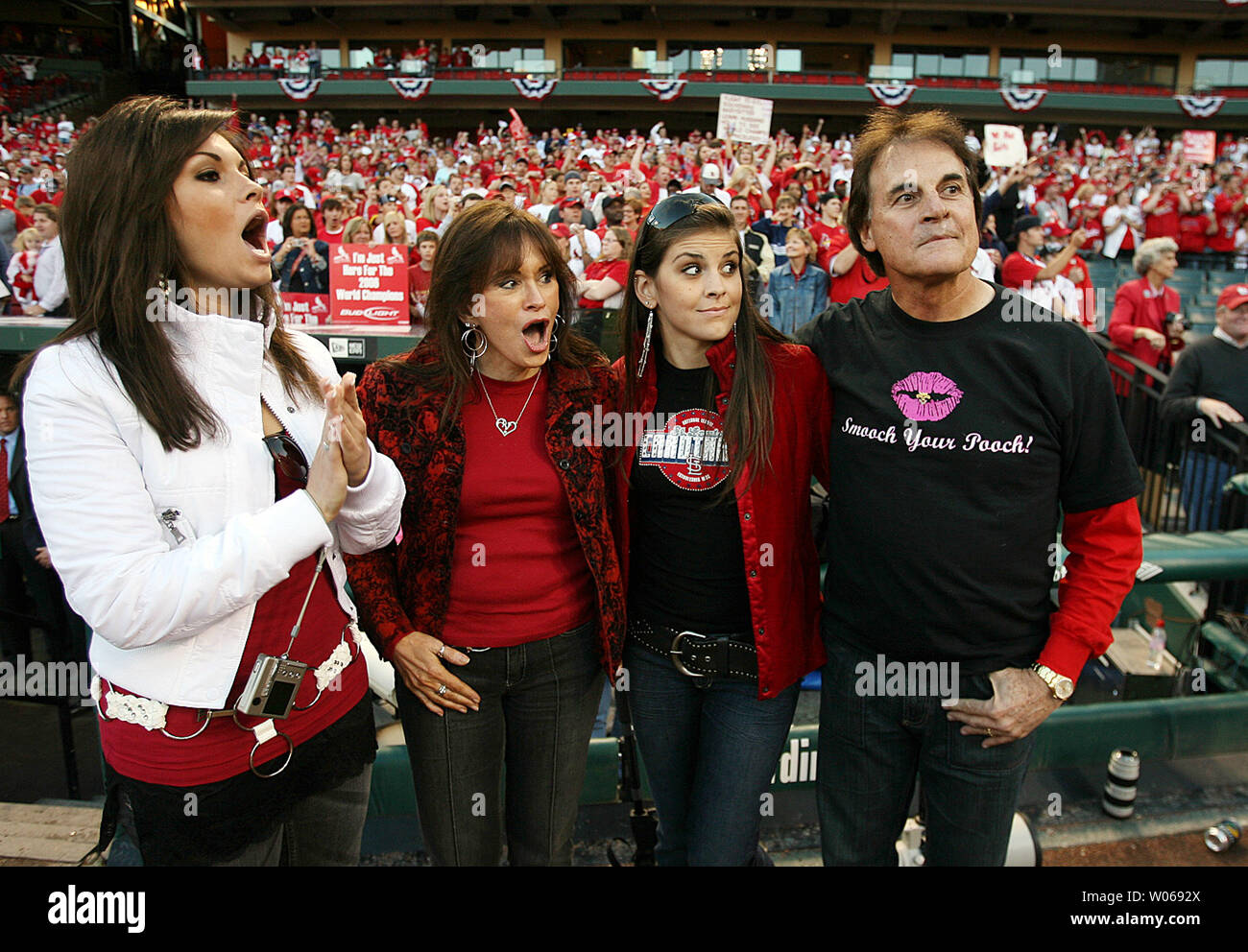 St. Louis Cardinals manager Tony La Russa stands with (L to R) daughter  Bianca, wife Elaine and daughter Devon during a celebration ceremony for  the new World Champions at Busch Stadium in