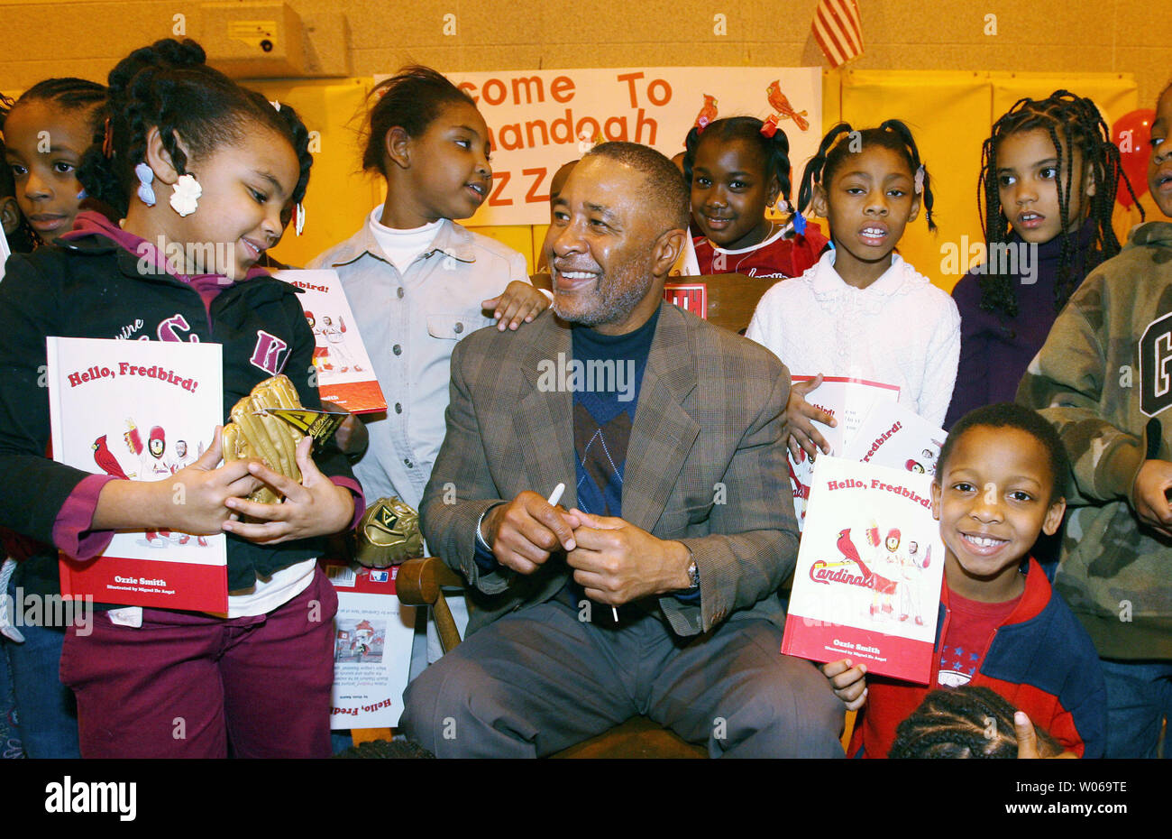 Former St. Louis Cardinals shortstop and National Baseball Hall of Fame  member Ozzie Smith visits with children after reading to them from his new  book Hello, Fredbird at the Shenandoah School in