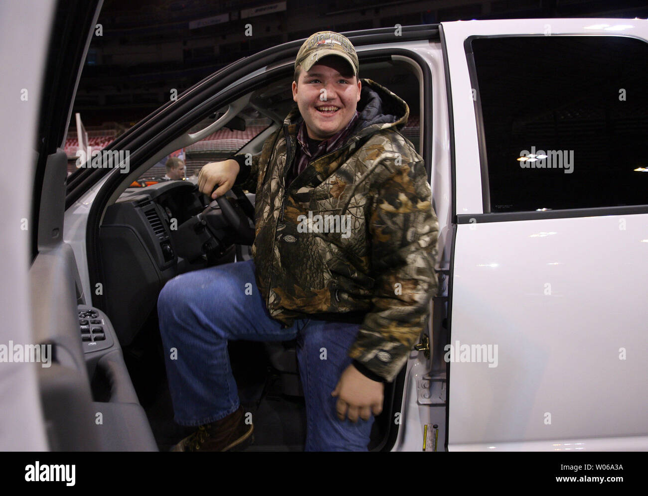 Mitchell Hults, the 15-year-old who identified the get-a-way vehicle used by kidnapper Michael Devlin to kidnap Ben Ownby on January 8, 2007, gets a closeup look at the new truck given to him as a reward by Chrysler at the St. Louis Auto Show in St. Louis on January 24, 2007. Although only 15, Hults will turn 16 in six months and plans to use it to haul an ATV. (UPI Photo/Bill Greenblatt) Stock Photo