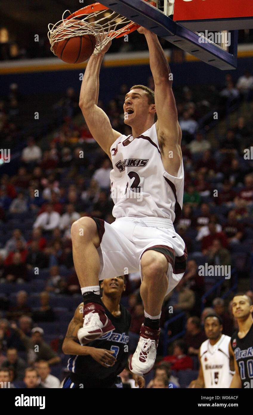 Southern Illinois' Salukis Matt Shaw slams the basketball into the net for  two points against the Drake Bulldogs in the first half of a quarter final  game of the Missouri Valley Tournament