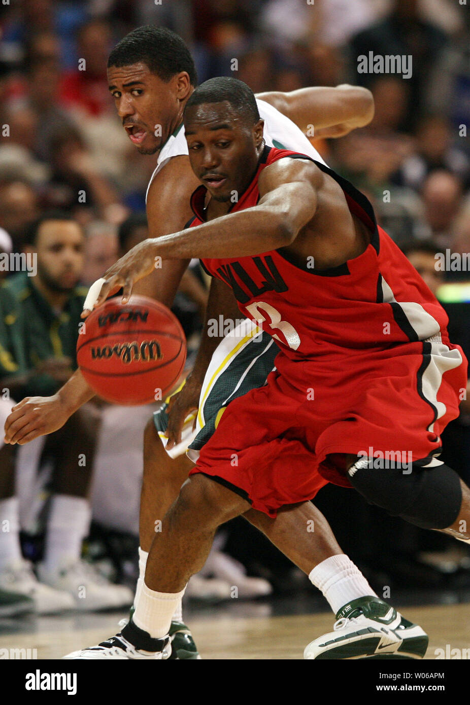 UNLV Runnin' Rebels Michael Umeh (3) steals the basketball from Oregon Ducks Bryce Taylor in the first half of the NCAA Midwest Regional at the Edward Jones Dome in St. Louis on March 23, 2007. (UPI Photo/Bill Greenblatt) Stock Photo