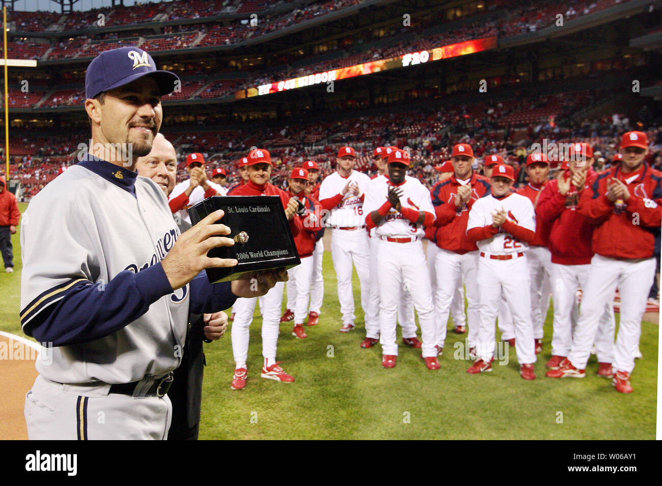 Milwaukee Brewers pitcher Jeff Suppan shows off his World Series  Championship ring as his former St. Louis Cardinals teammates clap during  ceremonies in St. Louis on April 13, 2007. Suppan left the