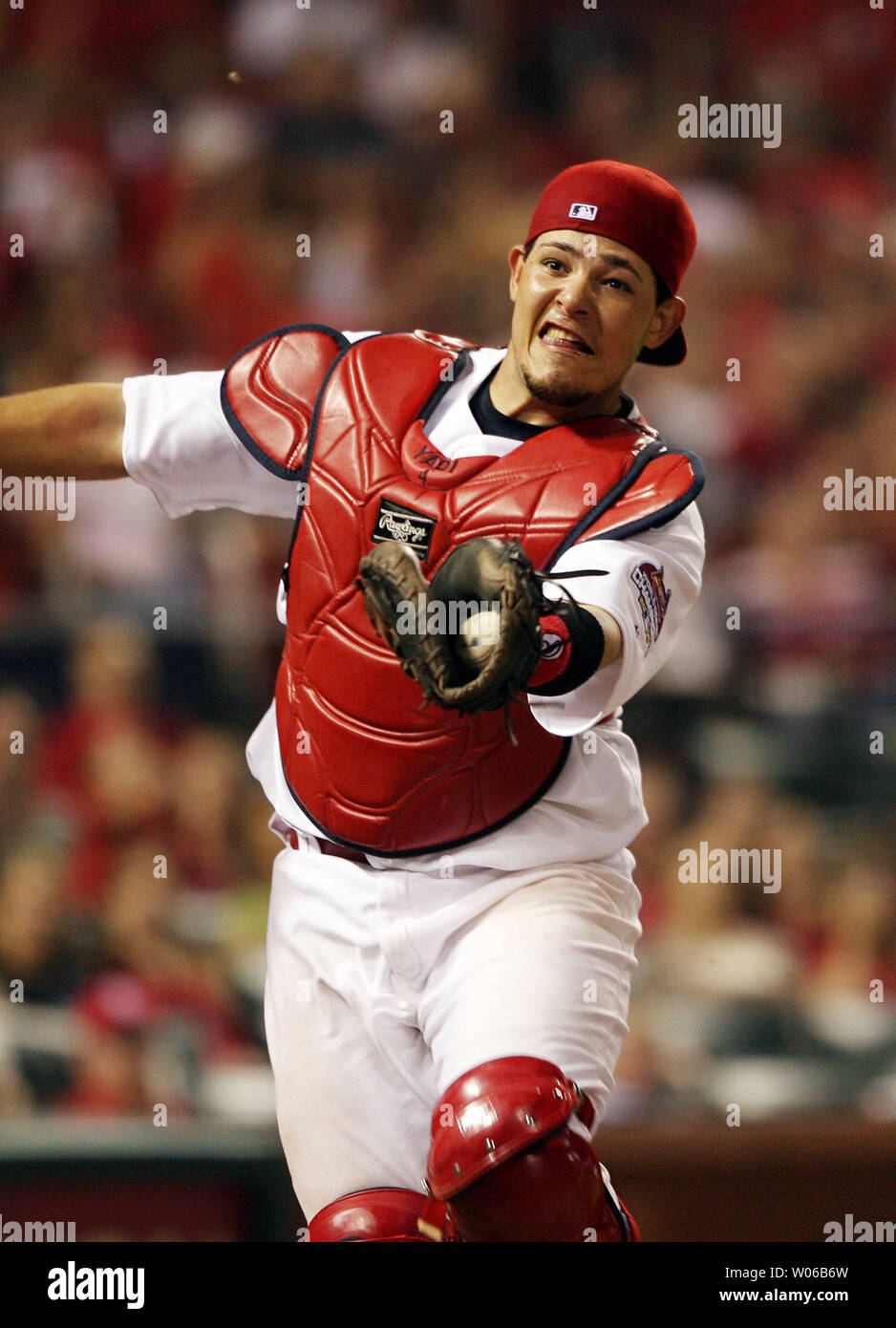 St. Louis Cardinals catcher Yadier Molina makes a running catch in foul territory for the out on Pittsburgh Pirates Jack Wilson in the eighth inning at Busch Stadium in St. Louis on May 22, 2007.     (UPI Photo/Bill Greenblatt) Stock Photo