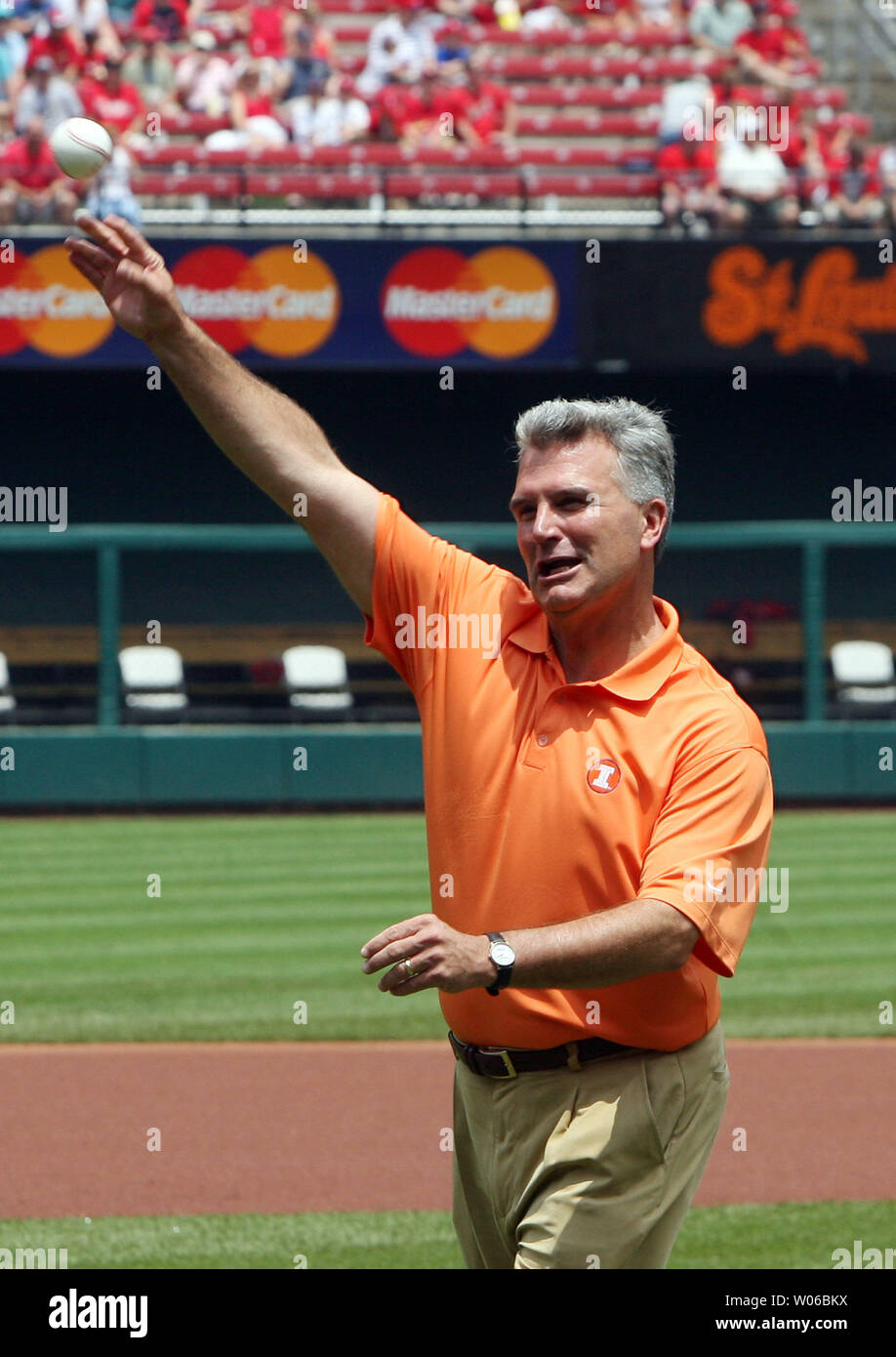University of Illinois' head basketball coach Bruce Weber throws out a ceremonial first pitch before the Philadelphia Phillies - St. Louis Cardinals baseball game at Busch Stadium in St. Louis on June 24, 2007.   (UPI Photo/Bill Greenblatt) Stock Photo