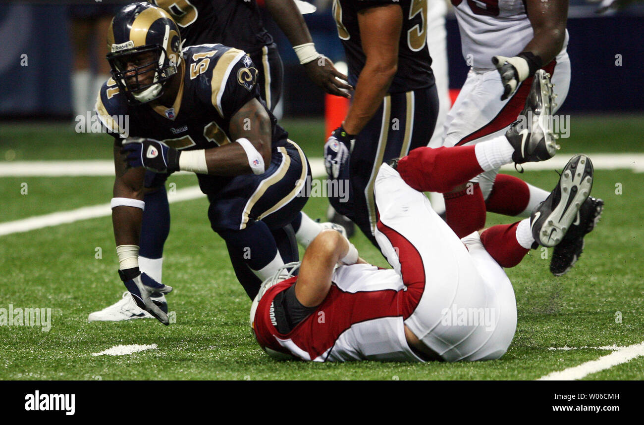 St. Louis Rams Will Witherspoon (L) celebrates a sack of Arizona Cardinals quarterback Matt Leinart in the second quarter at the Edward Jones Dome in St. Louis on October 7, 2007. Leinart left the game after the play with a broken left collarbone and is expected to be out six to eight weeks. (UPI Photo/Bill Greenblatt) Stock Photo