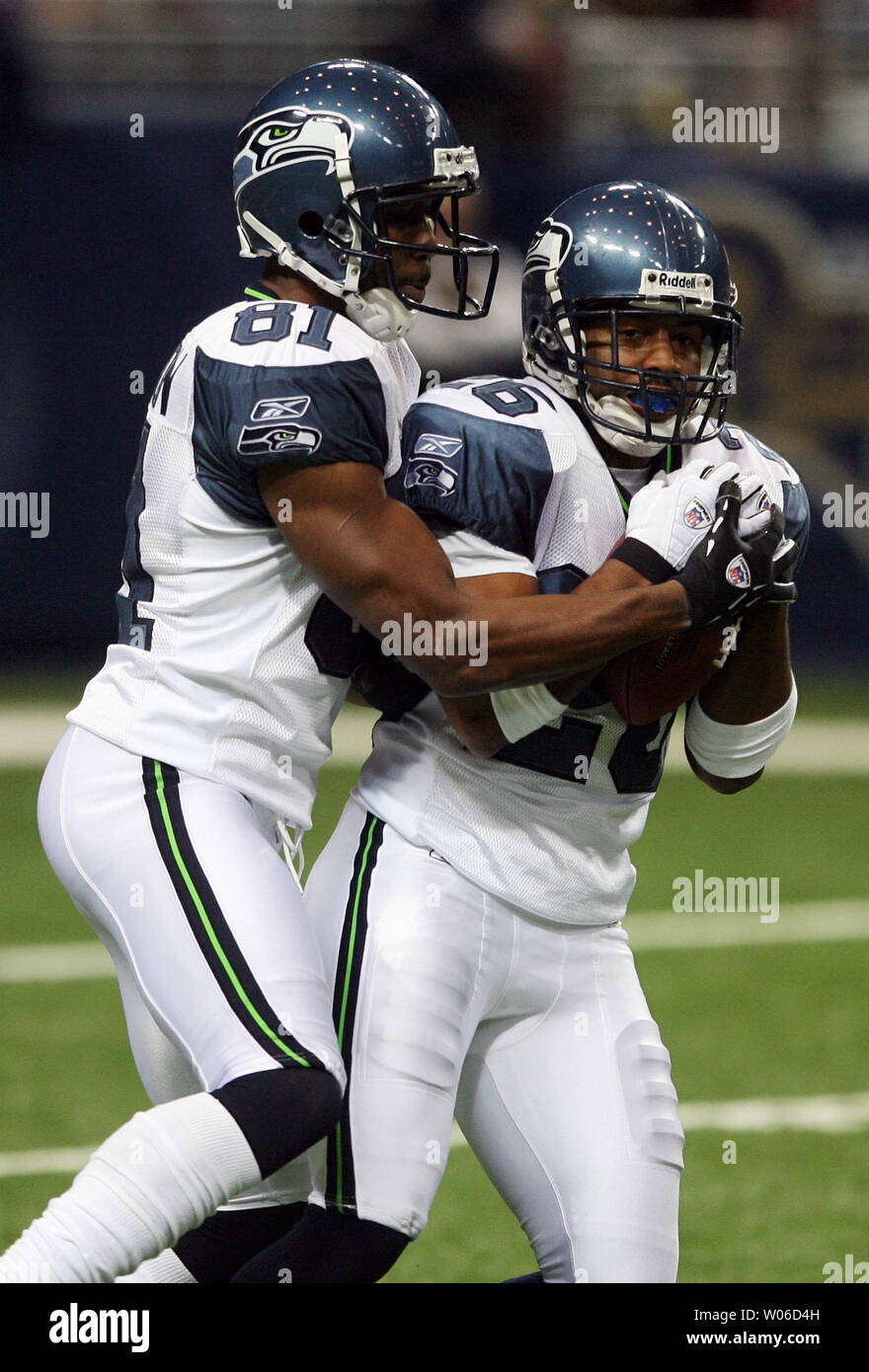 Seattle Seahawks Nate Burleson (L) and Josh Wilson collide after confusion on who should take the St. Louis Rams kickoff return in the first quarter at the Edward Jones Dome in St. Louis on November 25, 2007. (UPI Photo/Bill Greenblatt) Stock Photo