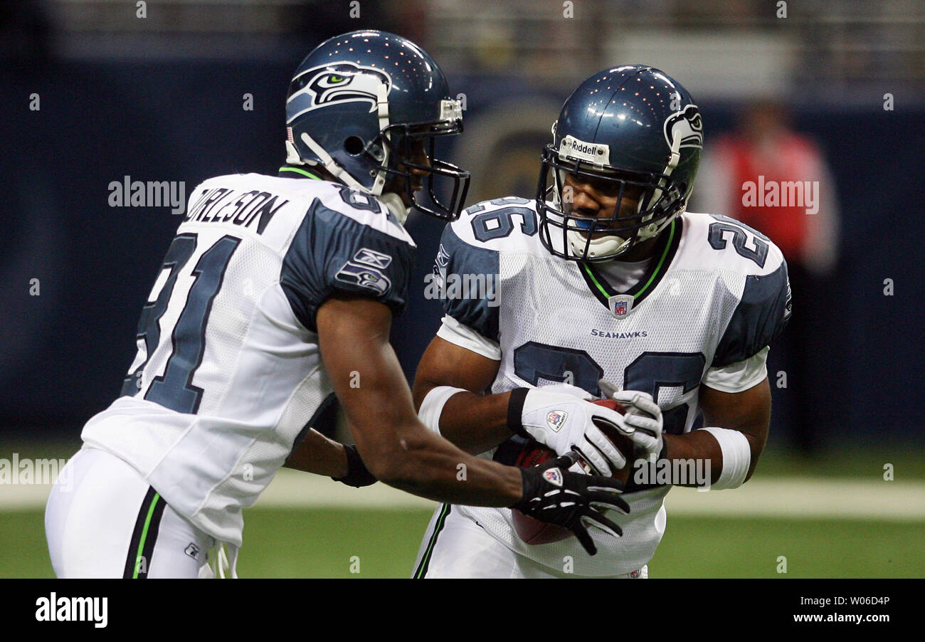 Seattle Seahawks Nate Burleson (L) and Josh Wilson collide after confusion on who should take the St. Louis Rams kickoff return in the first quarter at the Edward Jones Dome in St. Louis on November 25, 2007. (UPI Photo/Bill Greenblatt) Stock Photo