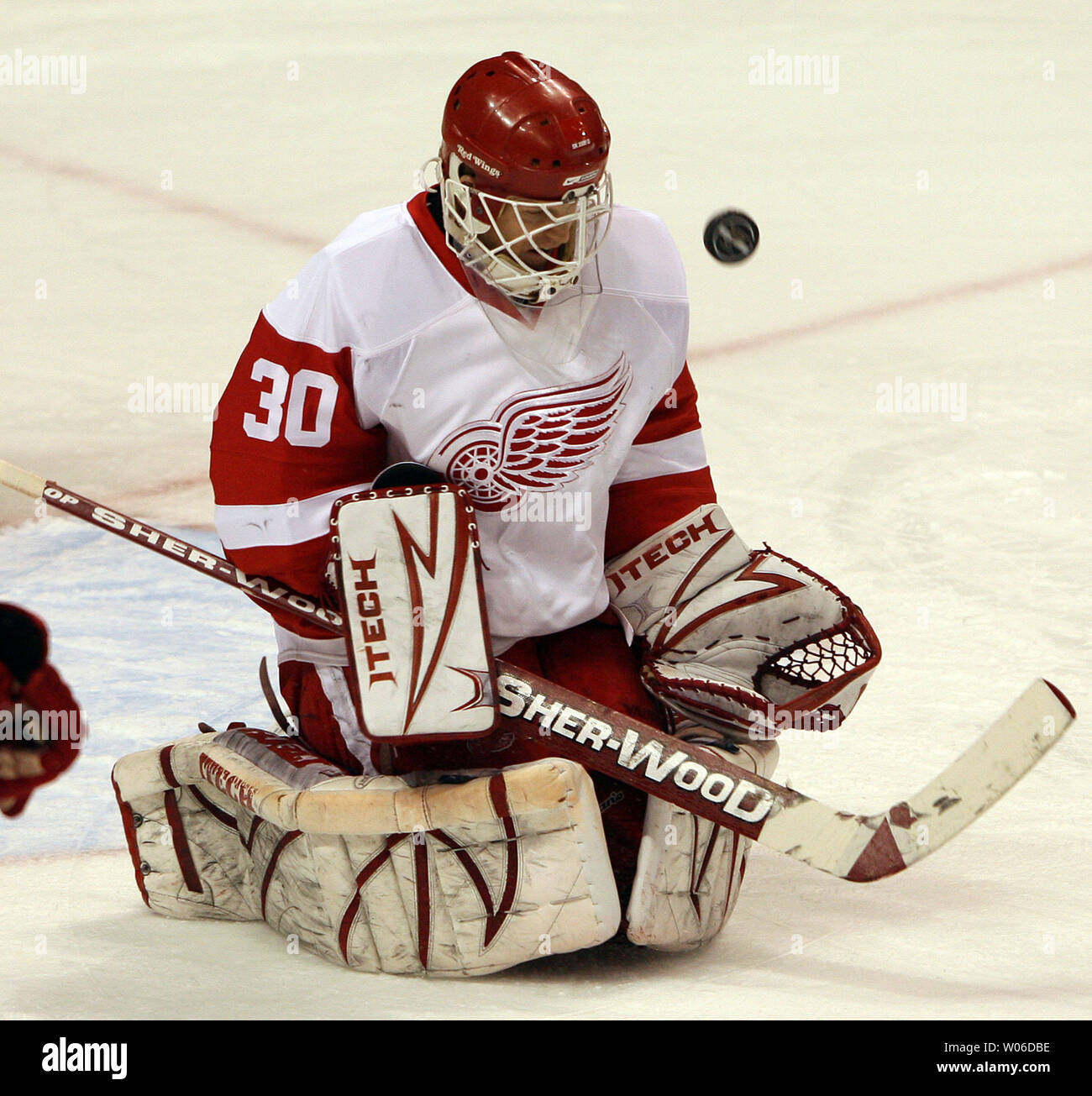 Detroit Red Wings goaltender Chris Osgood follows the puck after a shot on goal by the St. Louis Blues in the first period at the Scottrade Center in St. Louis on December 26, 2007. (UPI Photo/Bill Greenblatt) Stock Photo