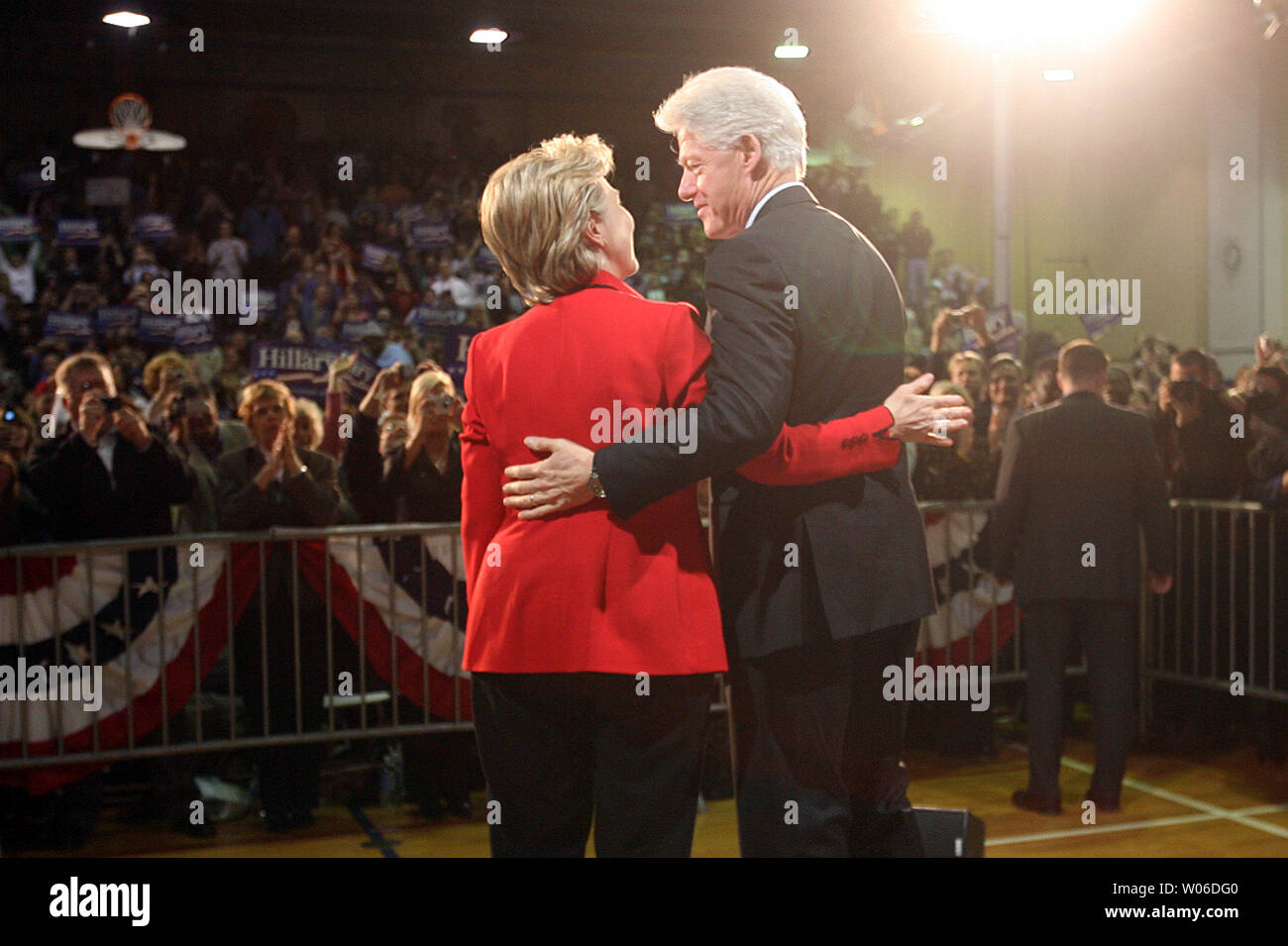 Democratic presidential hopeful Sen. Hillary Clinton (D-NY) embraces with husband former U.S. President Bill Clinton during a campaign stop at McClure North High School in Florissant, Missouri on January 19, 2008. (UPI Photo/Bill Greenblatt) Stock Photo