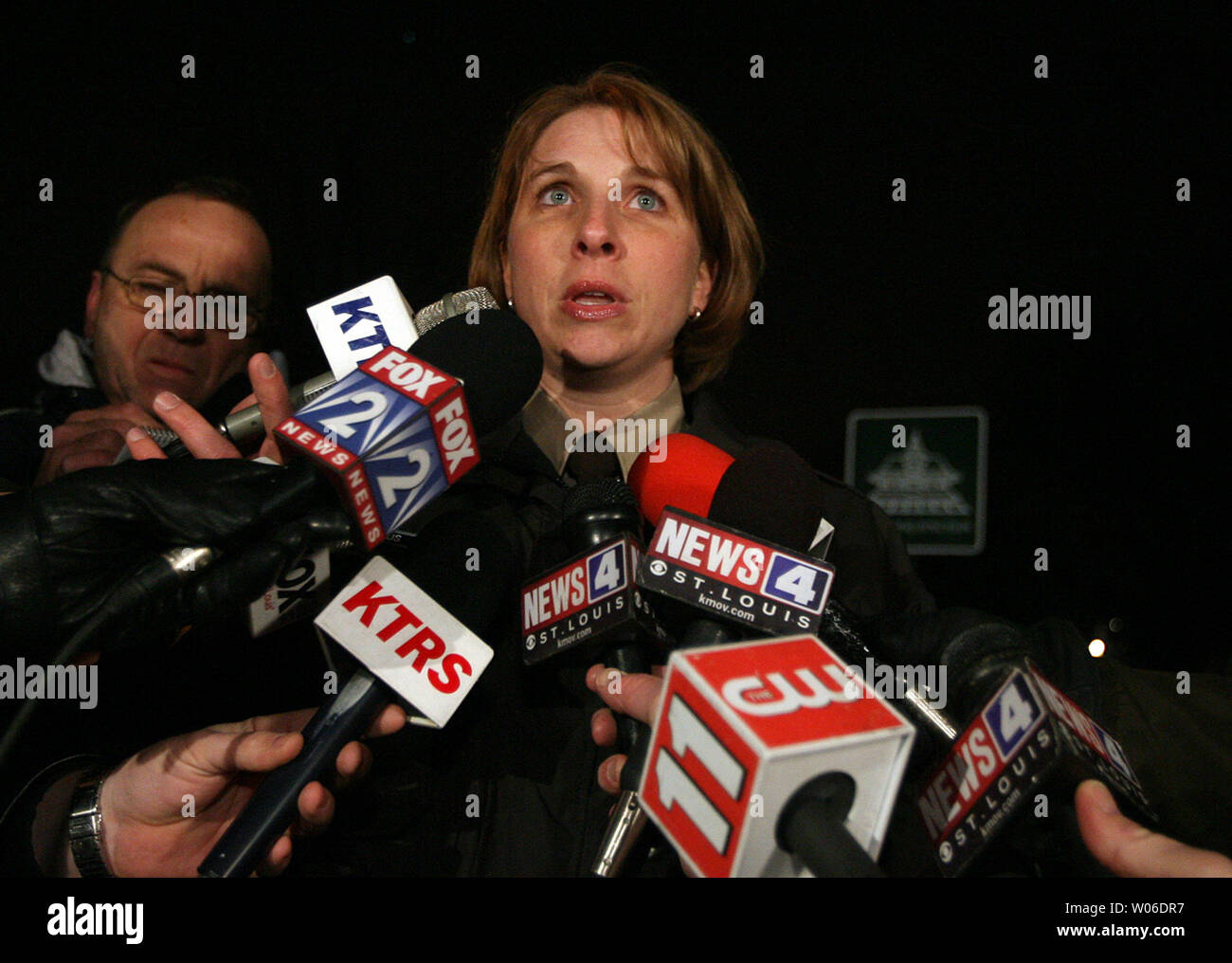 A tearful Tracy Panes, public information officer for the St. Louis County Police Department, gives her first press briefing outside of the Kirkwood City Hall following a shooting inside during a Planning and Zoning meeting that left six dead and two injured in Kirkwood, Missouri on February 7, 2008. Among the dead were two Kirkwood policeman and the gunman that was well known to the police. Two other injuries included the mayor who was shot in the head and is in critical condition and a newspaper reporter who was shot in the hand.     (UPI Photo/Bill Greenblatt) Stock Photo