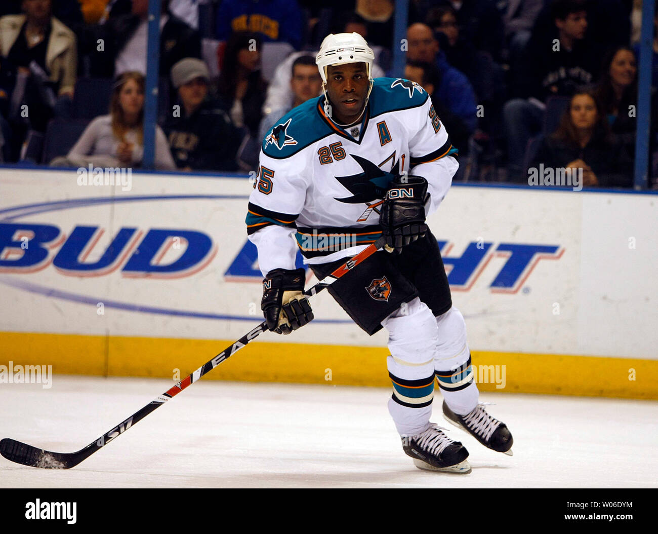 San Jose Sharks Mike Grier chases the puck against the St. Louis Blues in  the first period at the Scottrade Center in St. Louis on December 29, 2007.  San Jose won the