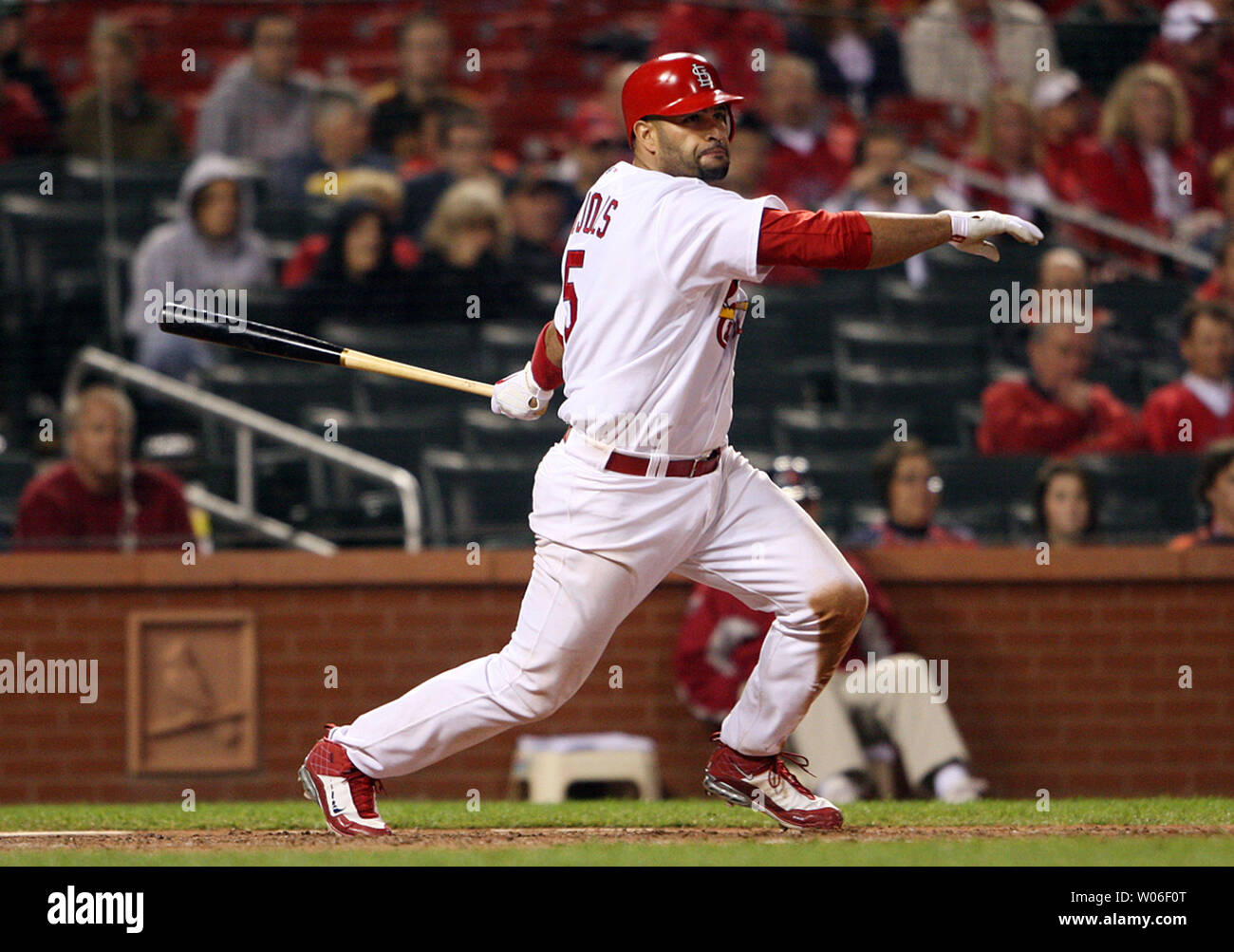 St. Louis Cardinals Albert Pujols swings as he hits a solo home run in the  seventh inning against the Milwaukee Brewers at Busch Stadium in St. Louis  on July 1, 2010. UPI/Bill