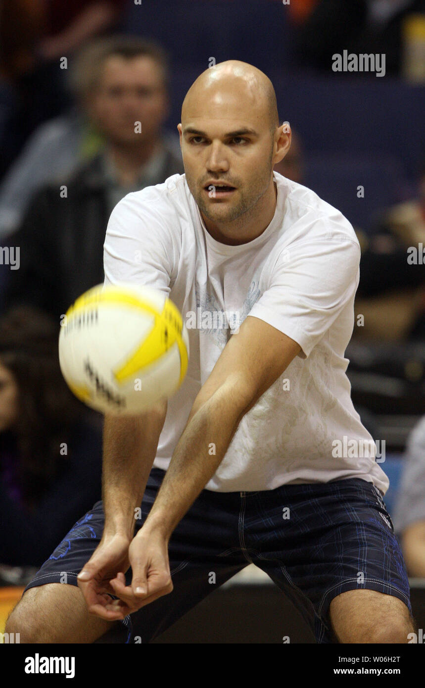Sand Volleyball player and Olympic Gold Medalist Phil Dalhausser warms