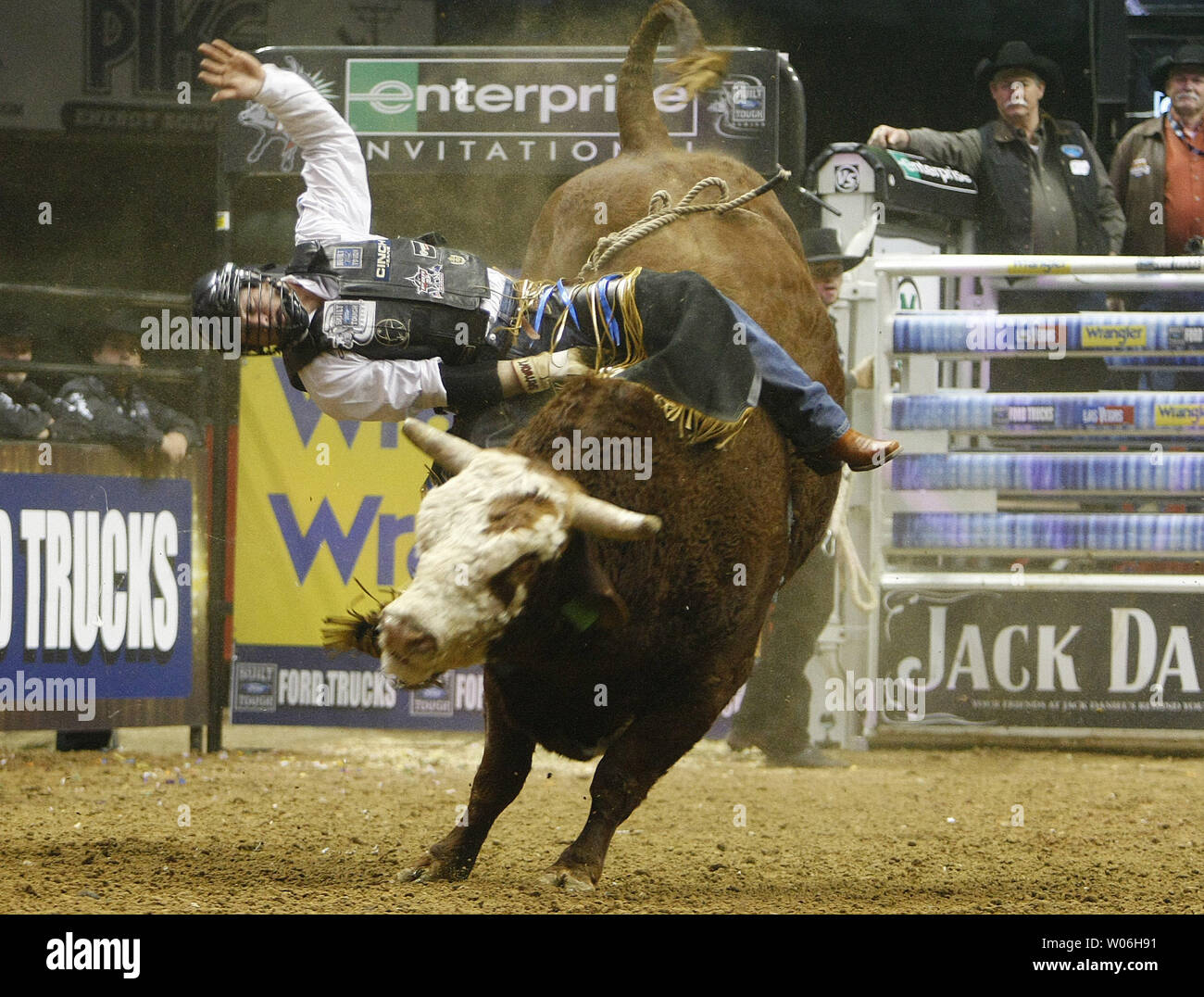 Bullrider Brandon Clark from Morpeth, AU holds onto Ace in the Hole, the  bull during his ride at the Professional Bullriders event at the Scottrade  Center in St. Louis on February 28,