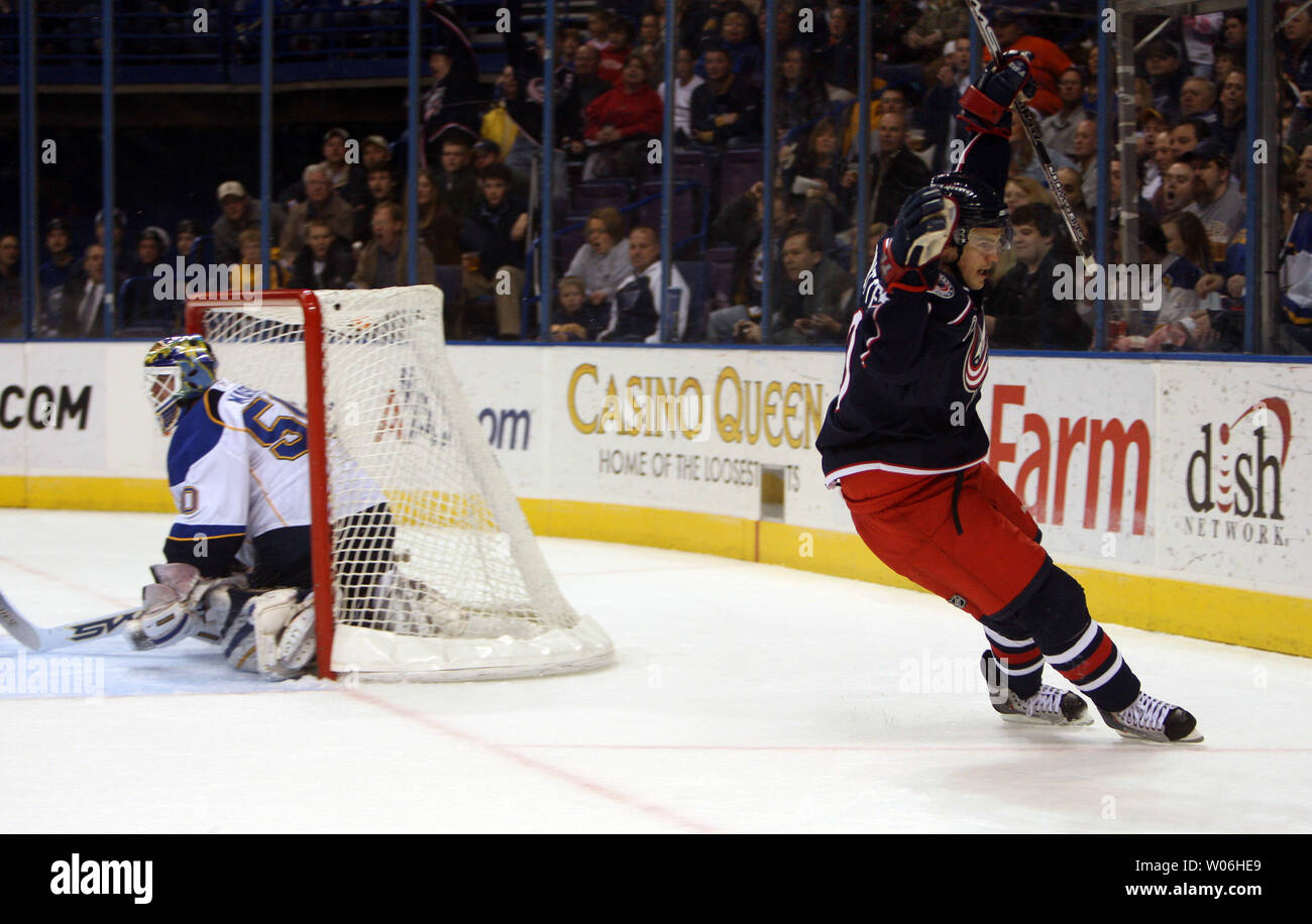 Columbus Blue Jackets Antoine Vermette (R) celebrates his first period goal shot past St. Louis Blues goaltender Chris Mason in the first period at the Scottrade Center in St. Louis on March 28, 2009. (UPI Photo/Bill Greenblatt) Stock Photo
