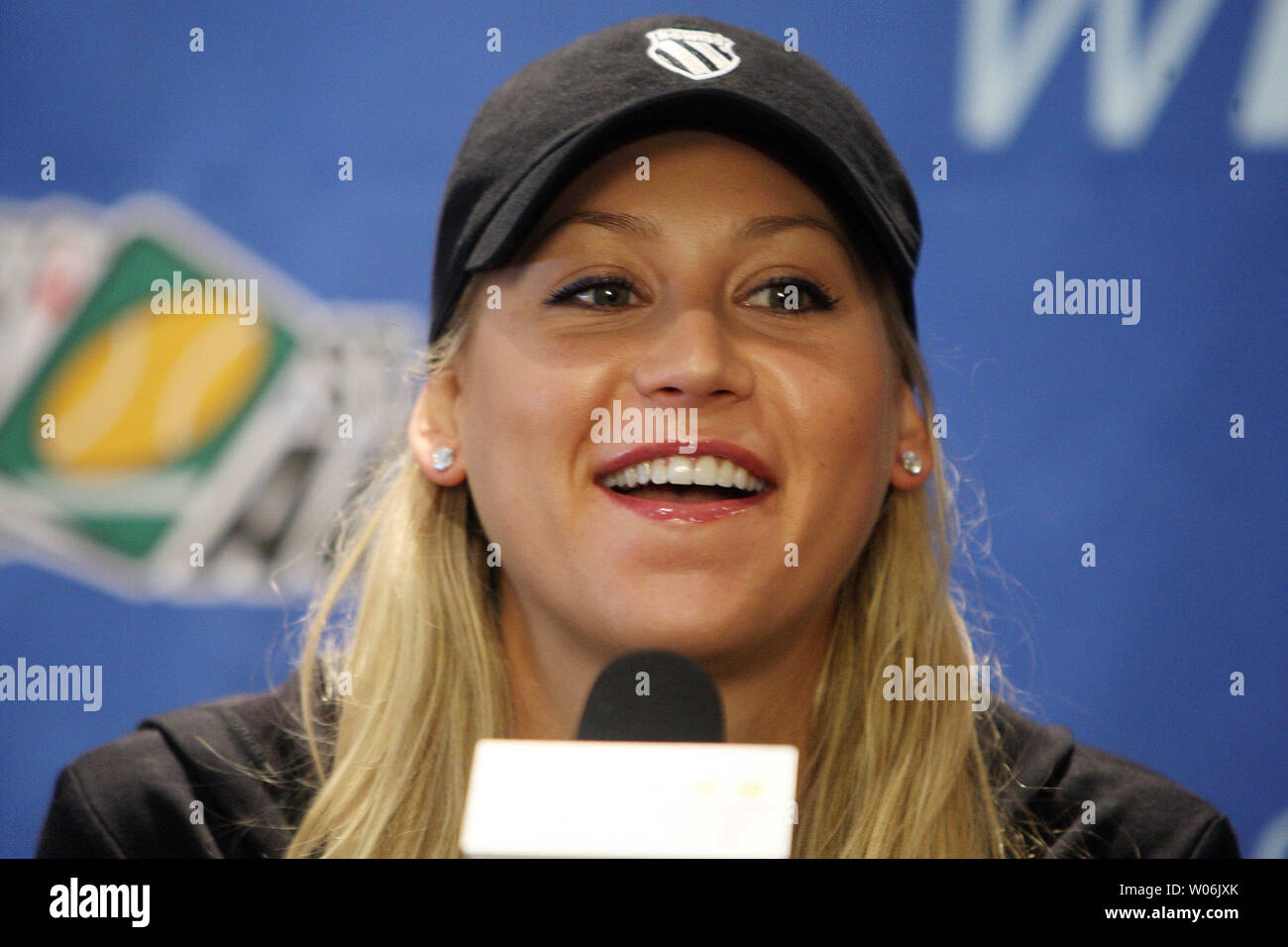 Tennis star Anna Kournikova speaks to reporters during a press conference in St. Louis on July 11, 2009. Kournikova, who has an injured wrist, will not play, as scheduled, at the World Team Tennis with the St. Louis Aces.    (UPI Photo/Bill Greenblatt) Stock Photo