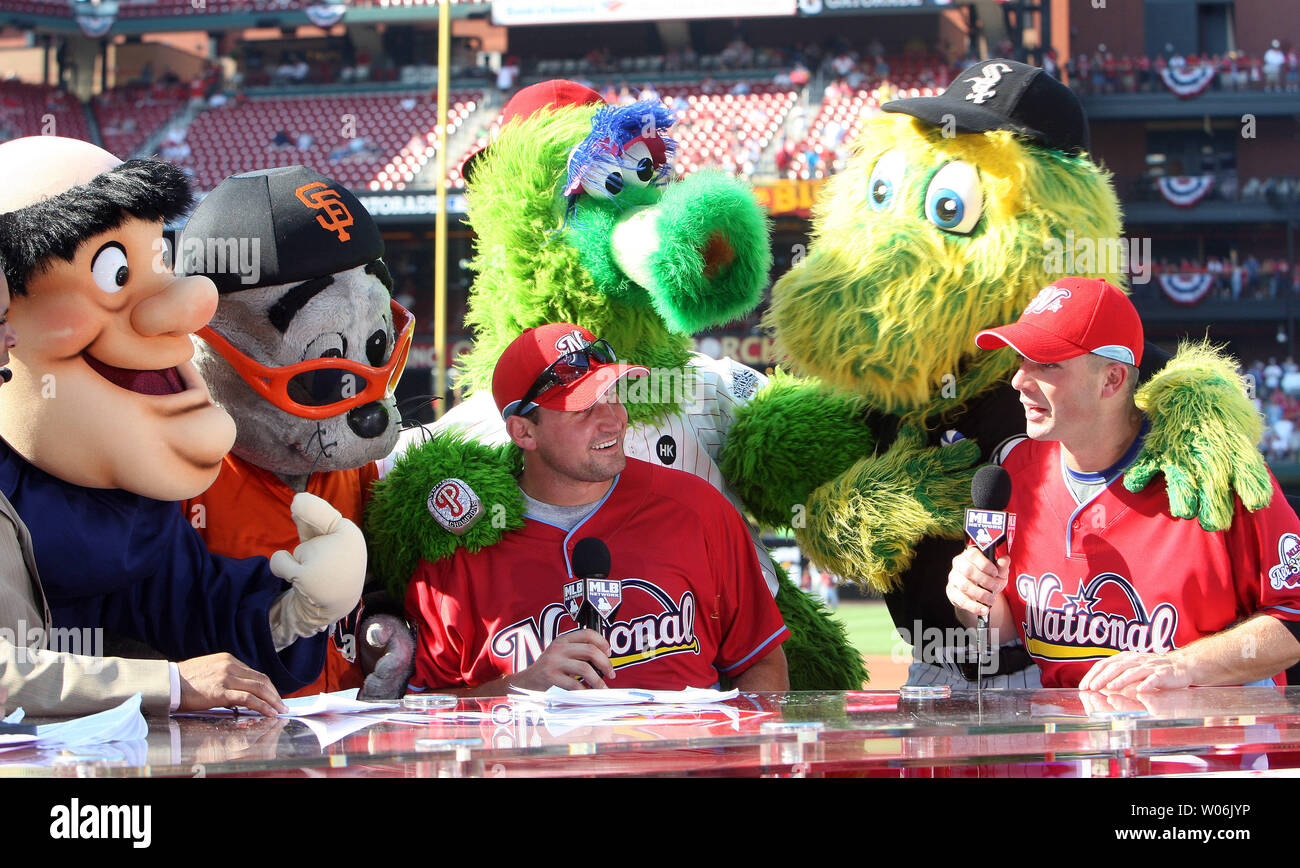 Baseball mascots join National League players Ryan Zimmerman (L) and David Wright during a MLB Television broadcast at Busch Stadium in St. Louis on July 13, 2009. Baseball's All Stars will play the 80th All Star Game on July 14, 2009. (UPI Photo/Bill Greenblatt) Stock Photo
