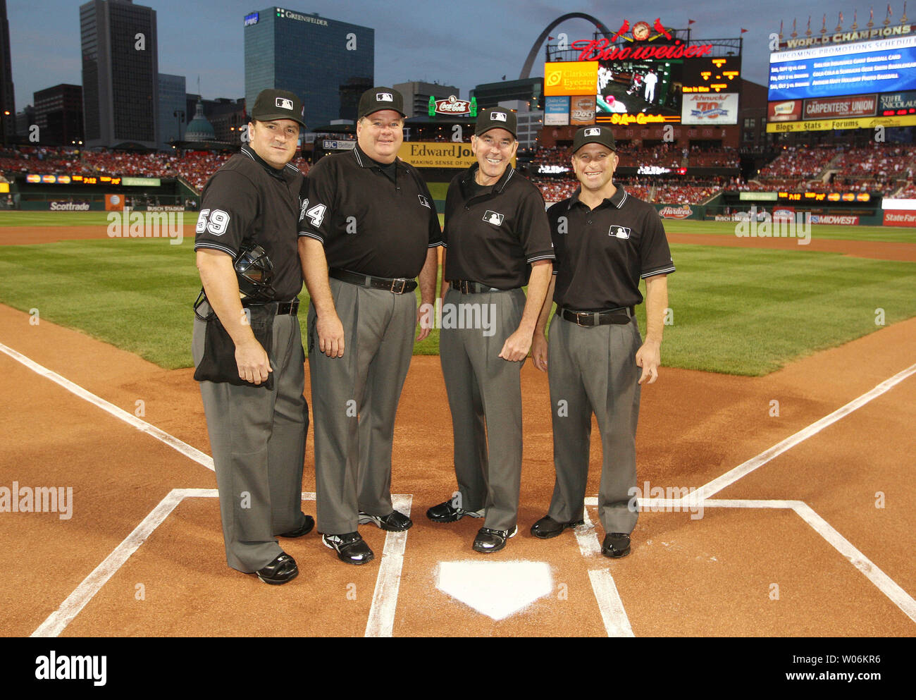 Umpires (L to R) Tony Randazzo, Jerry Layne, Mike Winters and Chris Guccione pose for a photograph before the Florida Marlin-St. Louis Cardinals baseball game at Busch Stadium in St. Louis on September 14, 2009.   UPI/Bill Greenblatt Stock Photo