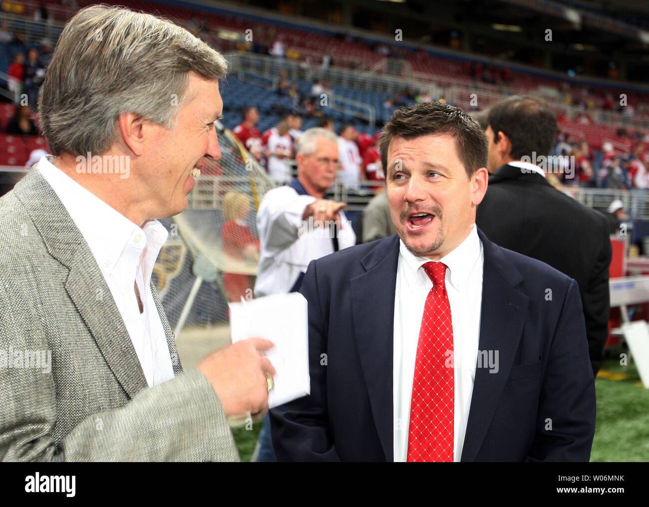 Arizona Cardinals President Michael Bidwill (R) chats with former St. Louis  Football Cardinals and Pro Football Hall of Famer Roger Wehrli before the  Arizona-St. Louis Rams football game at the Edward Jones