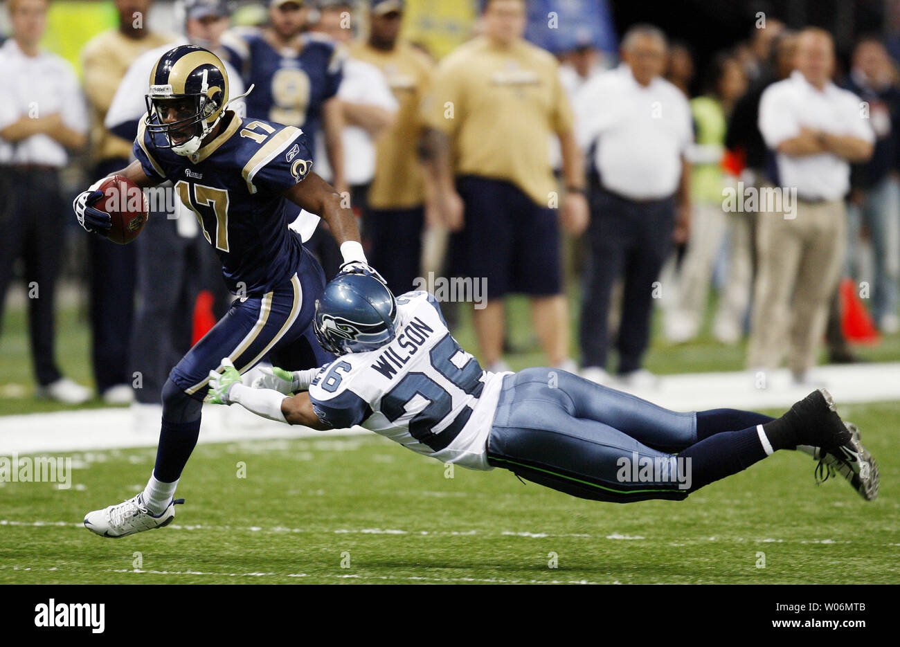 St. Louis Rams Donnie Avery (L) eludes the tackle by Seattle Seahawks Josh Wilson in the first quarter at the Edward Jones Dome in St. Louis on November 29, 2009. Seattle defeated St. Louis 27-17.    UPI/Bill Greenblatt Stock Photo