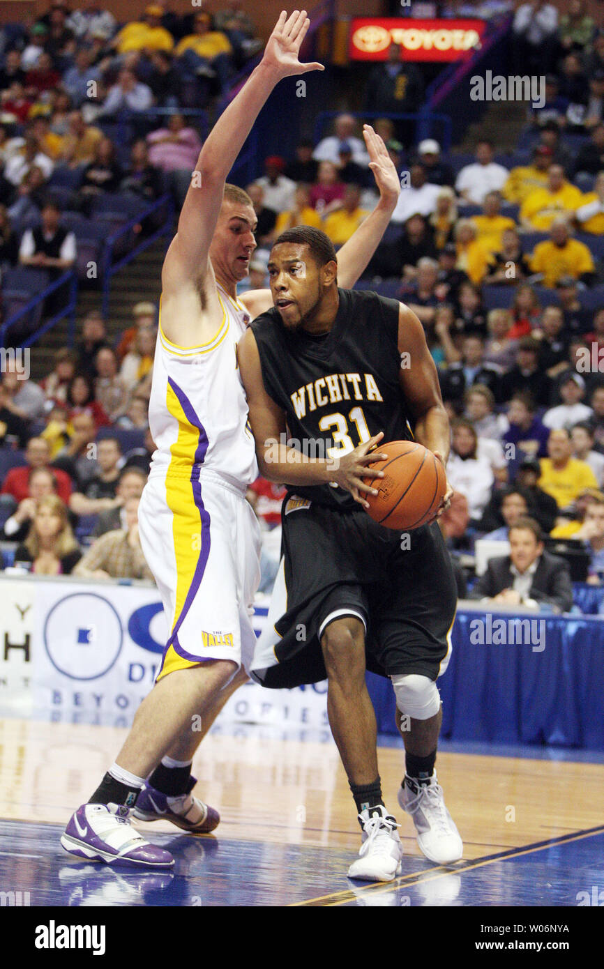 Wichita State Shockers JT Durley (R) steps out of bounds as he tries to move around Northern Iowa's Jake Koch during the second half of the Missouri Valley Conference Tournament Championship game at the Scottrade Center in St. Louis on March 7, 2010. Northern Iowa won the championship 67-52.   UPI/Bill Greenblatt Stock Photo