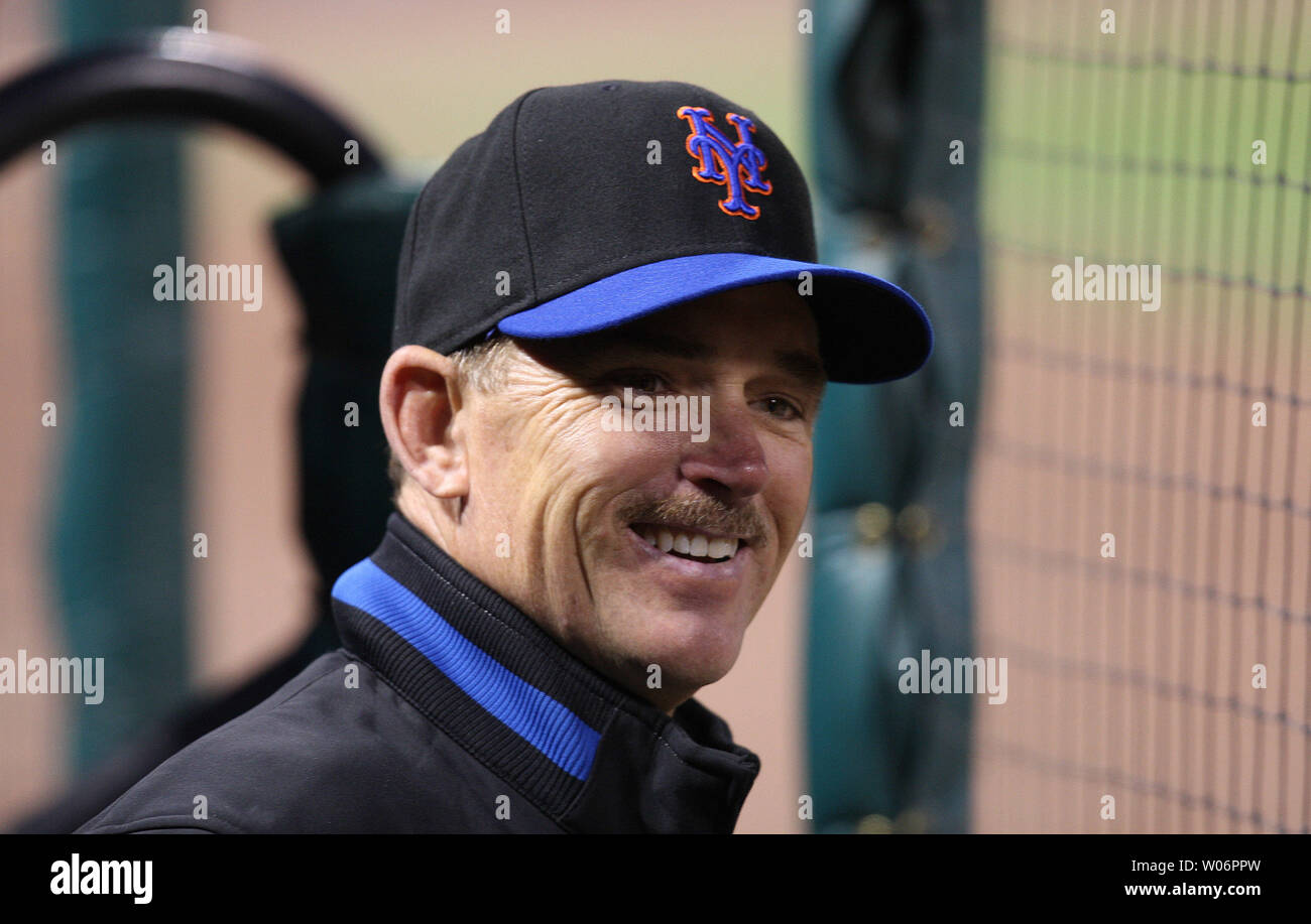 New York Mets coach Howard Johnson watches his team take on the St. Louis  Cardinals at Busch Stadium in St. Louis on July 1, 2008. The Mets won the  game 7-4. (UPI