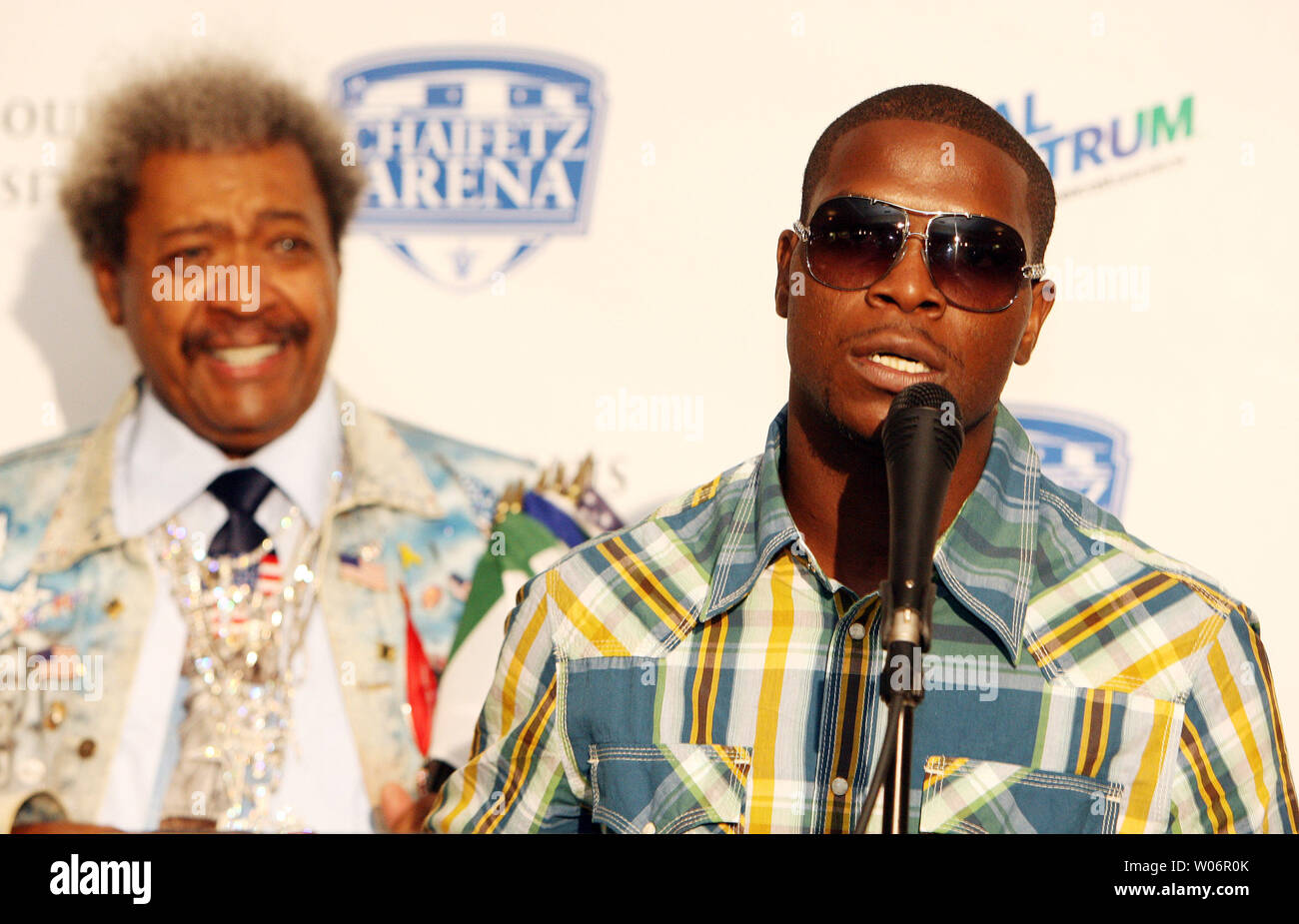IBF Jr. Middleweight title holder Cory Spinks (R) addresses reporters as promoter Don King looks on during a press conference at the Chaifetz Arena in St. Louis on May 12, 2010. Spinks will defend his title against challenger Cornelius Bundrage on June 12.    UPI/Bill Greenblatt Stock Photo