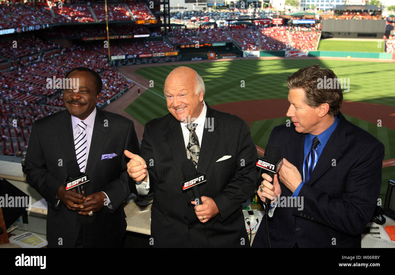 ESPN baseball announcers (L to R) Joe Morgan, Jon Miller and Orel Hershiser  joke around before a game between the Milwaukee Brewers and the St. Louis  Cardinals at Busch Stadium in St.