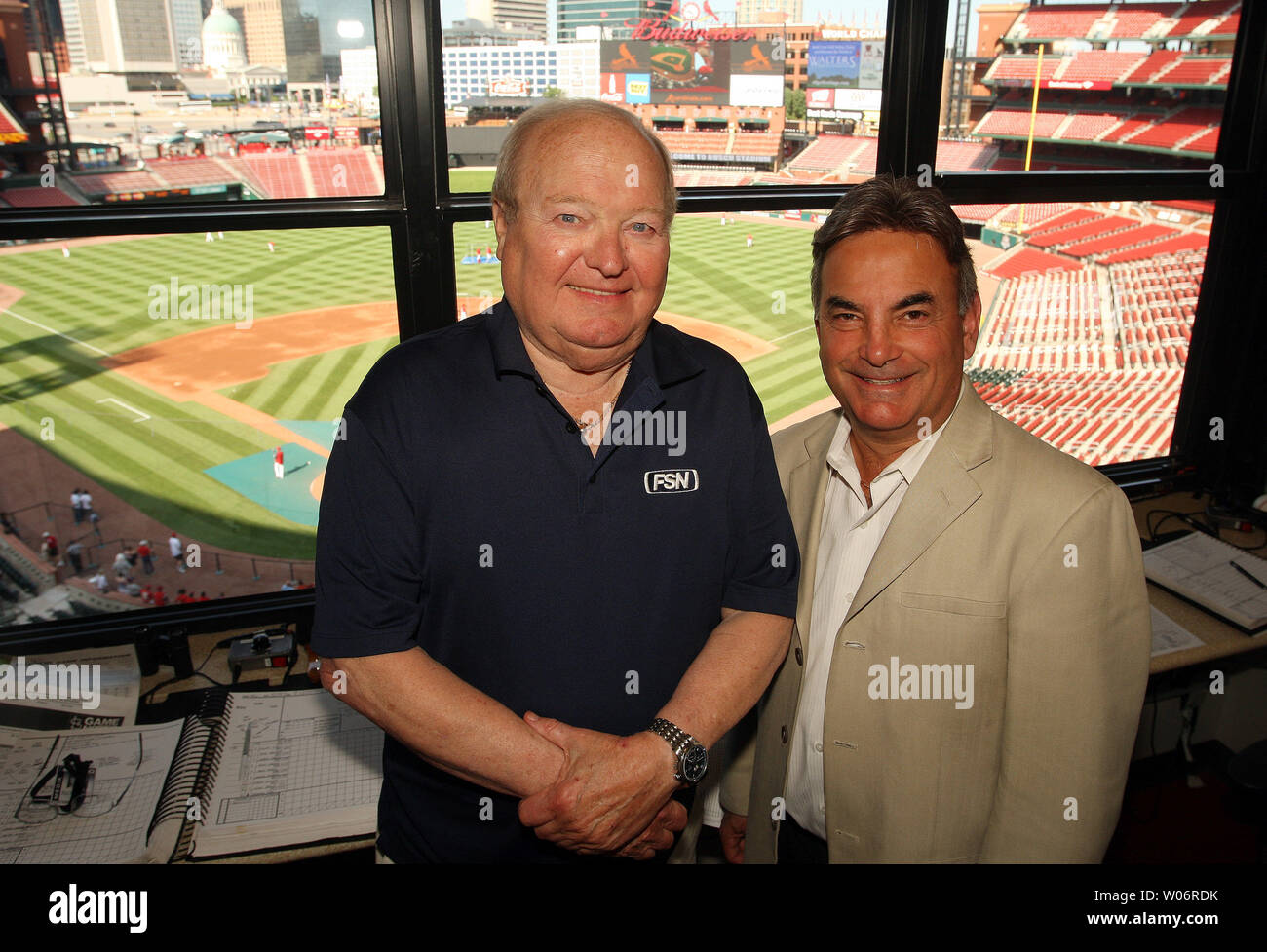 Seattle Mariners broadcasters National Baseball Hall of Fame member Dave Niehaus (L) and Rick ...