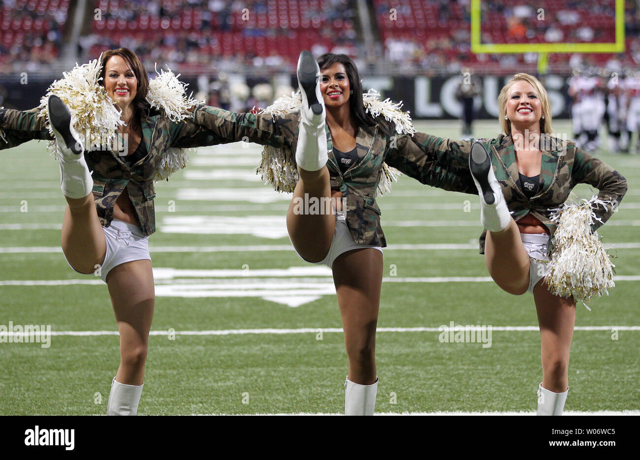 A St. Louis Rams cheerleader entertains the crowds during the Kansas City  Chiefs- St. Louis Rams football game in a Christmas outfit at the Edward  Jones Dome in St. Louis on December