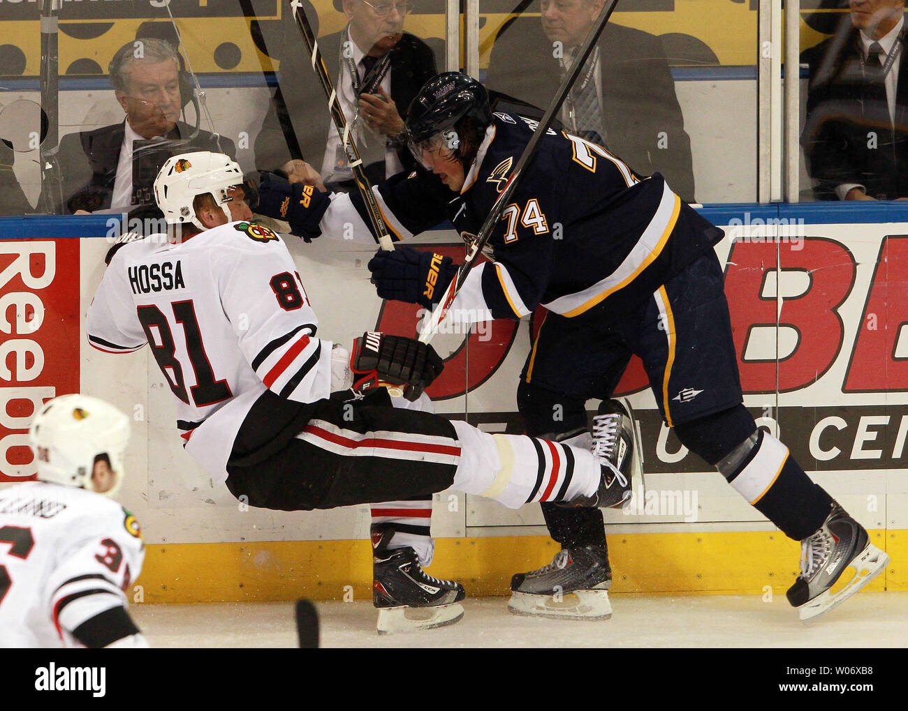 St. Louis Blues TJ Oshie (R) levels Chicago Blackhawks Marian Hossa of the Slovak Republic in the first period at the Scottrade Center in St. Louis on February 21, 2011.  UPI/Bill Greenblatt Stock Photo