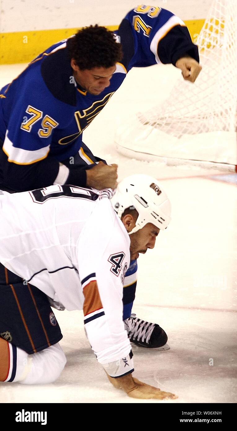 St. Louis Blues Ryan Reaves (75) is in a fight with Edmonton Oliers ...