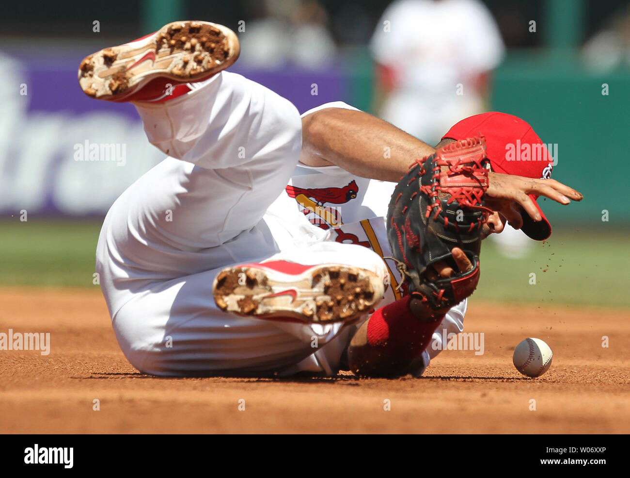 St. Louis Cardinals pitcher Michael Wacha can't make a play on a ball hit  by Washington Nationals Ryan Zimmerman in the ninth inning at Busch Stadium  in St. Louis on September 24