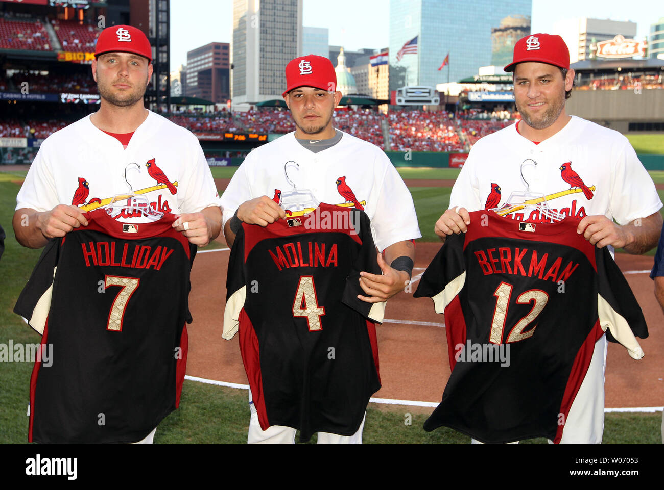 St. Louis Cardinals (L to R) Matt Holliday, Yadier Molina and Lance Berkman  showoff their National League All-Star Jerseys before a game against the  Arizona Diamondbacks at Busch Stadium in St. Louis