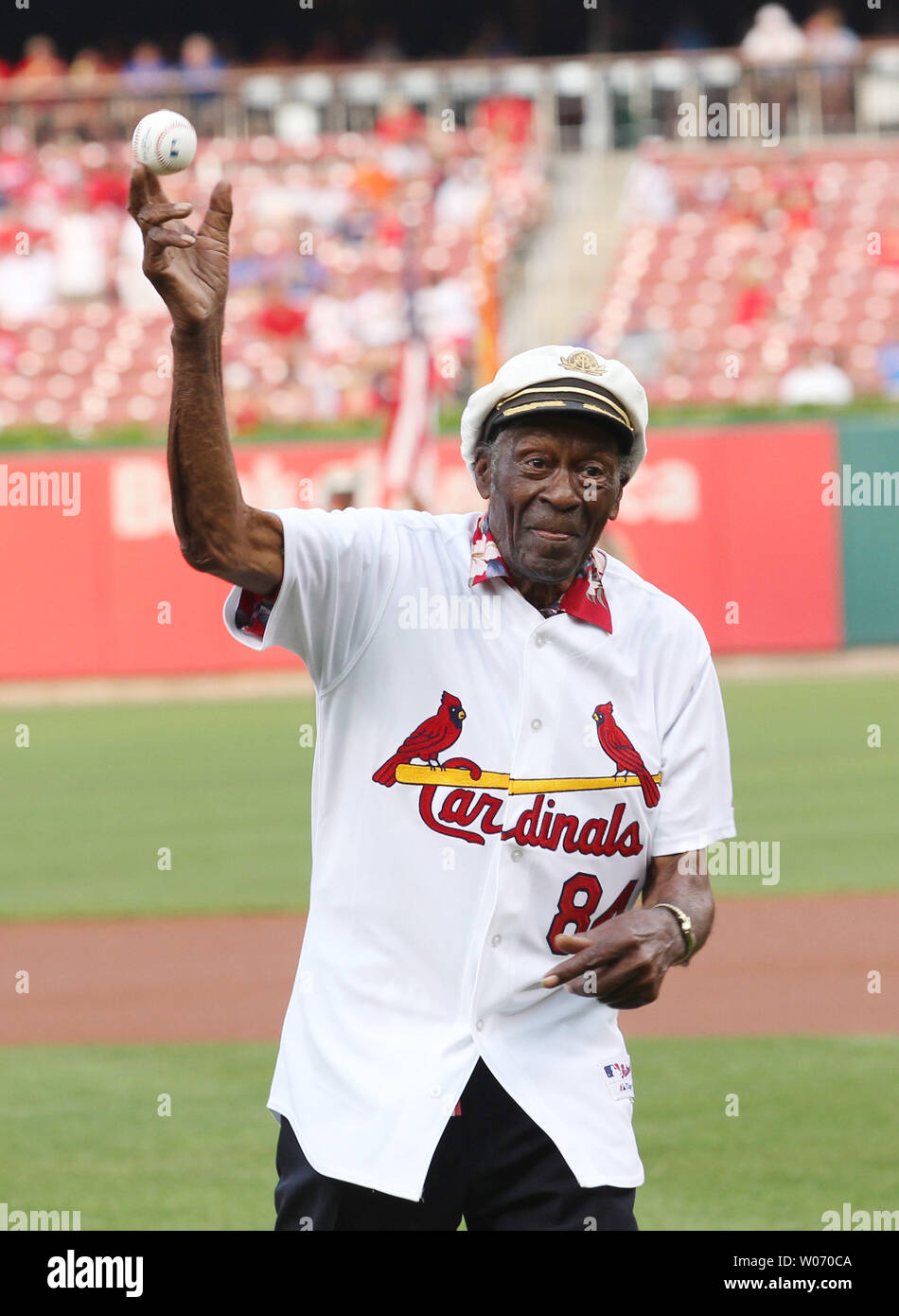 Rock and Roll legend Chuck Berry throws a ceremonial first pitch before the  Chicago Cubs-St.