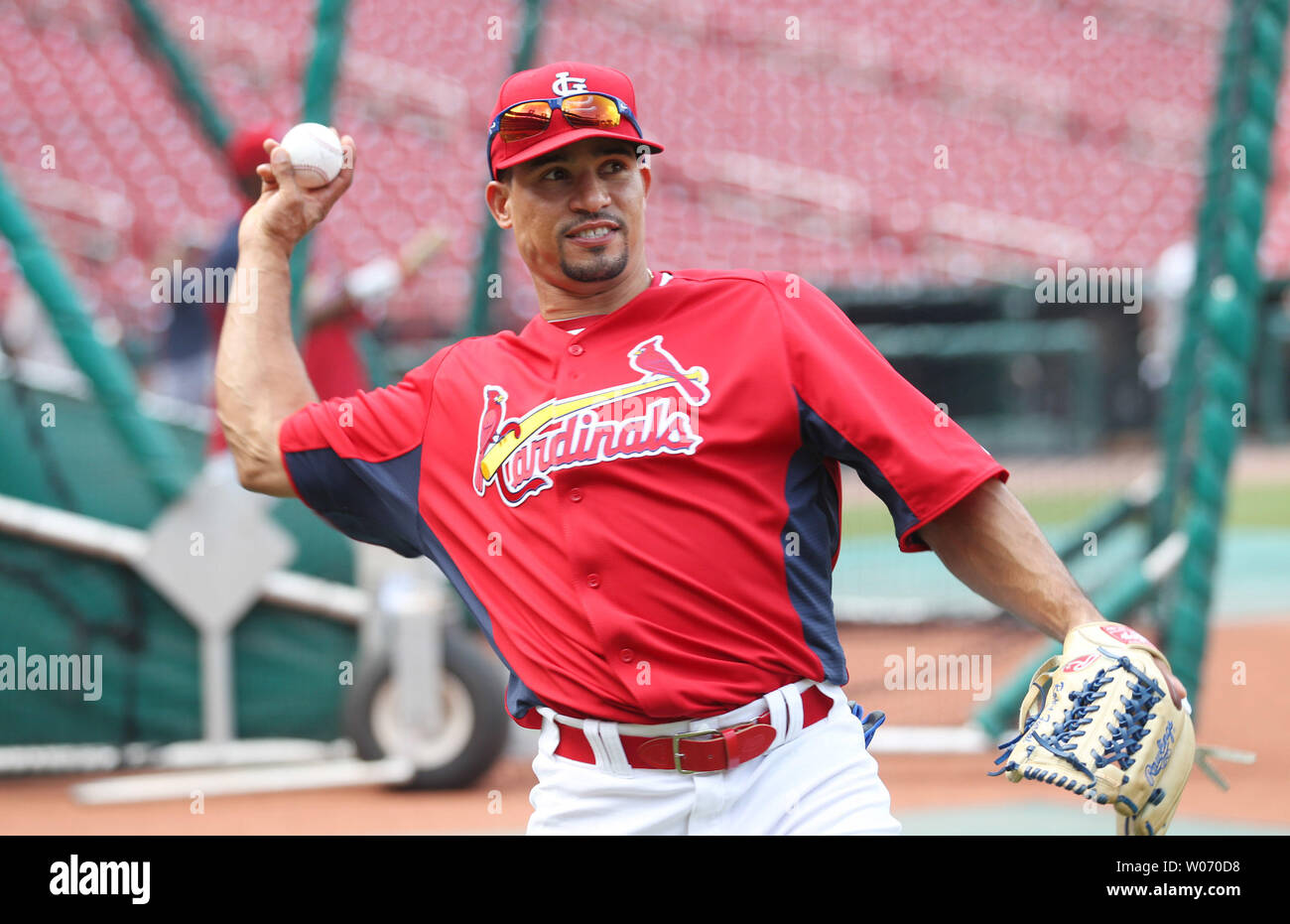 Newly acquired infielder Rafael Furcal throws the baseball during batting practice as a member of the St. Louis Cardinals at Busch Stadium in St. Louis on July 31, 2011. Furcal comes to