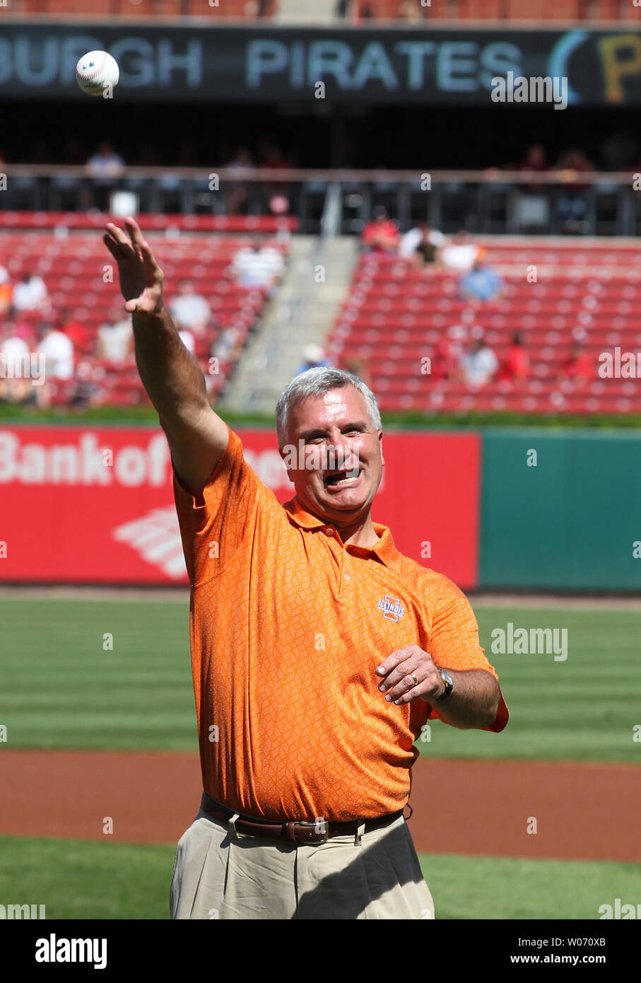 University of Illinois' head basketball coach Bruce Weber throws a ceremonial first pitch before the Pittsburgh Pirates-St. Louis Cardinals baseball game at Busch Stadium in St. Louis on August 27, 2011.  UPI/Bill Greenblatt Stock Photo