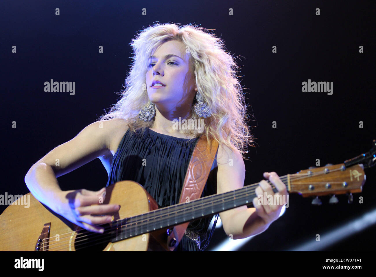 Kimberly Perry, lead singer for The Band Perry, entertains the crowds at the Pageant Theater during a concert to benefit the USO of Missouri, in St. Louis on September 30, 2011. UPI/Bill Greenblatt Stock Photo