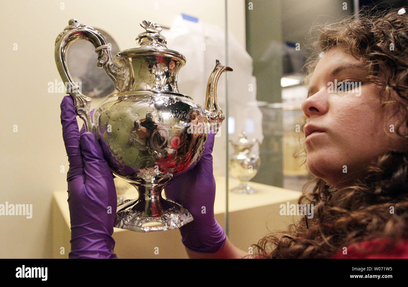 Catlin Carter a Conservation Lab Technician at the Missouri History Museum inspects a tea pot preserved from the Civil War era as the 'Civil War in Missouri,' display continues to set up at the Museum in St. Louis on November 8, 2011. To commemorate the sesquicentennial of the Civil War the Missouri History MuseumÕs comprehensive The Civil War in Missouri will feature items from America's bloodiest conflict. UPI/Bill Greenblatt Stock Photo