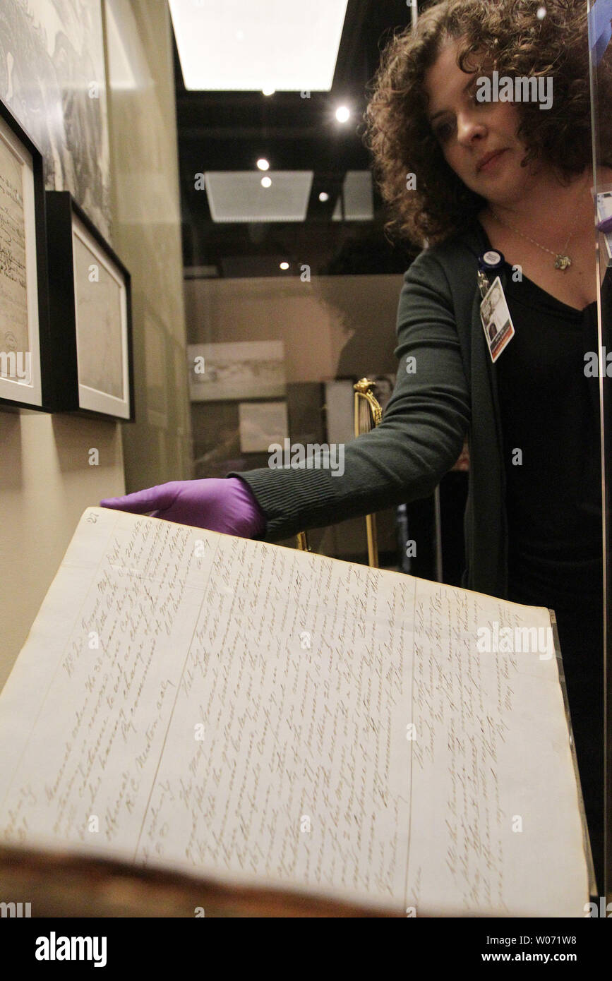 Amy Berra, Registrar at the Missouri History Museum installs a book from the Civil War era as the 'Civil War in Missouri,' display continues to set up at the Museum in St. Louis on November 8, 2011. To commemorate the sesquicentennial of the Civil War the Missouri History MuseumÕs comprehensive The Civil War in Missouri will feature items from America's bloodiest conflict. UPI/Bill Greenblatt Stock Photo