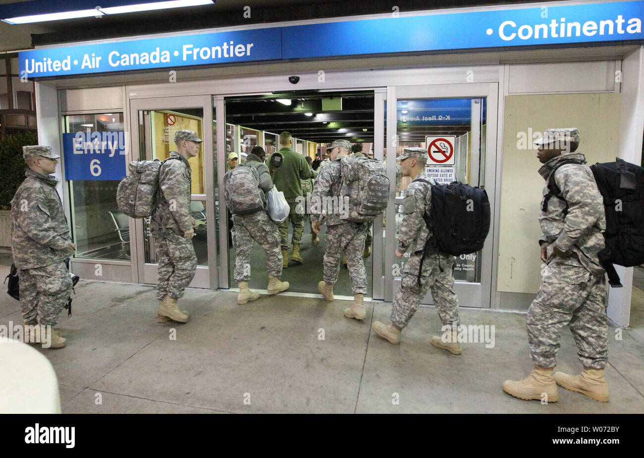 Troops from Fort Leonard Wood arrive at Lambert-St. Louis International Airport as Holiday Block Leave begins in St. Louis on December 21, 2011. Approximately 4,000 troops are participating in Holiday Block Leave, the day when military installations release their personnel for the holidays. The USO of Missouri will host many of them as they find their way home.   UPI/Bill Greenblatt Stock Photo