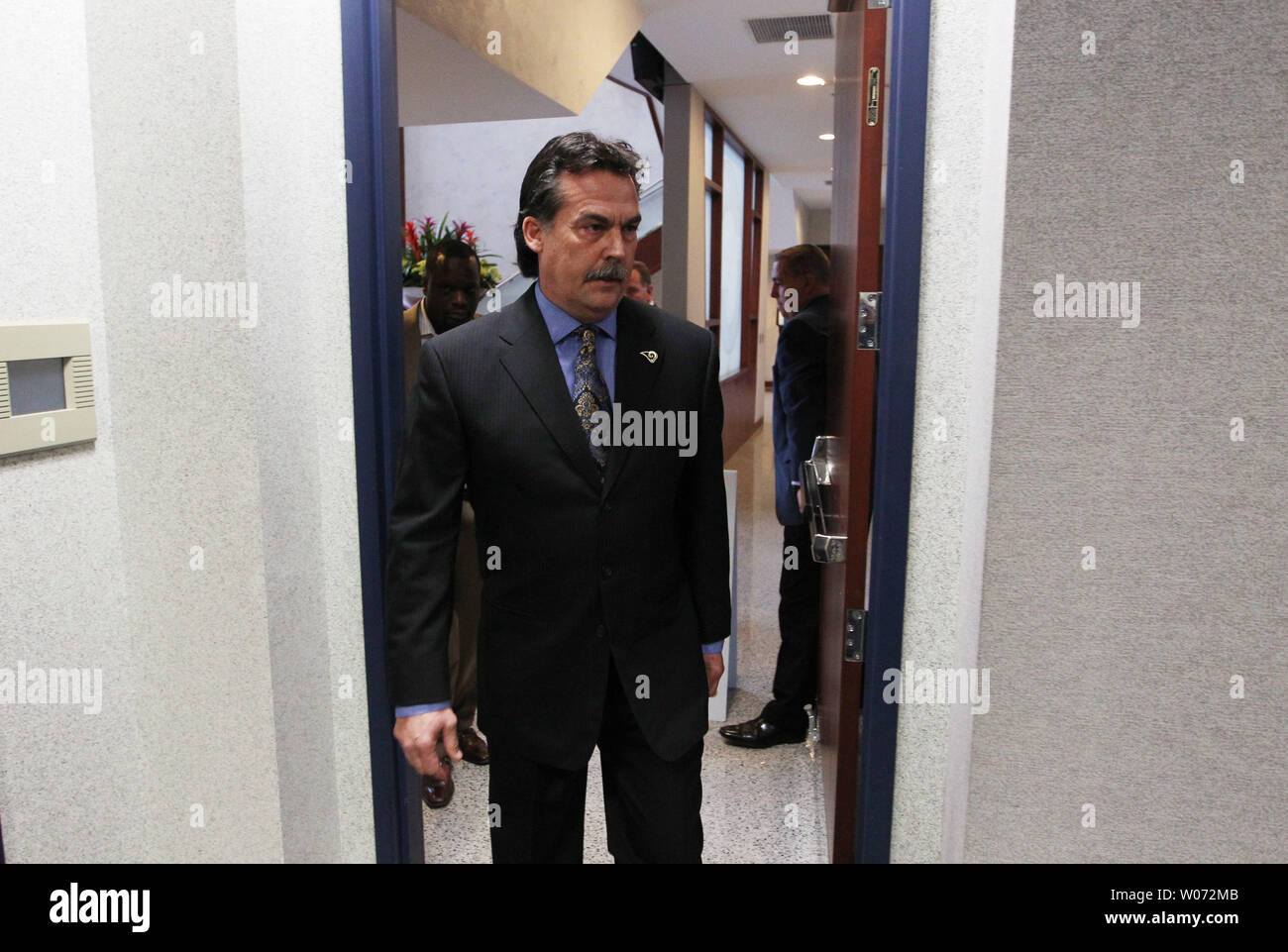 St. Louis Rams new head coach Jeff Fisher enter the room to be introduced at the team's practice facility in Earth City, Missouri on January 17, 2012.   UPI/Bill Greenblatt Stock Photo