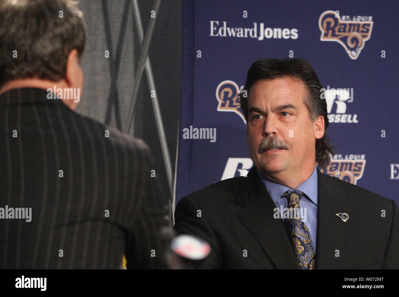 St. Louis Rams new head coach Jeff Fisher (R) is welcomed by team owner Stan Kronke as he is introduced at the team's practice facility in Earth City, Missouri on January 17, 2012. UPI/Bill Greenblatt Stock Photo