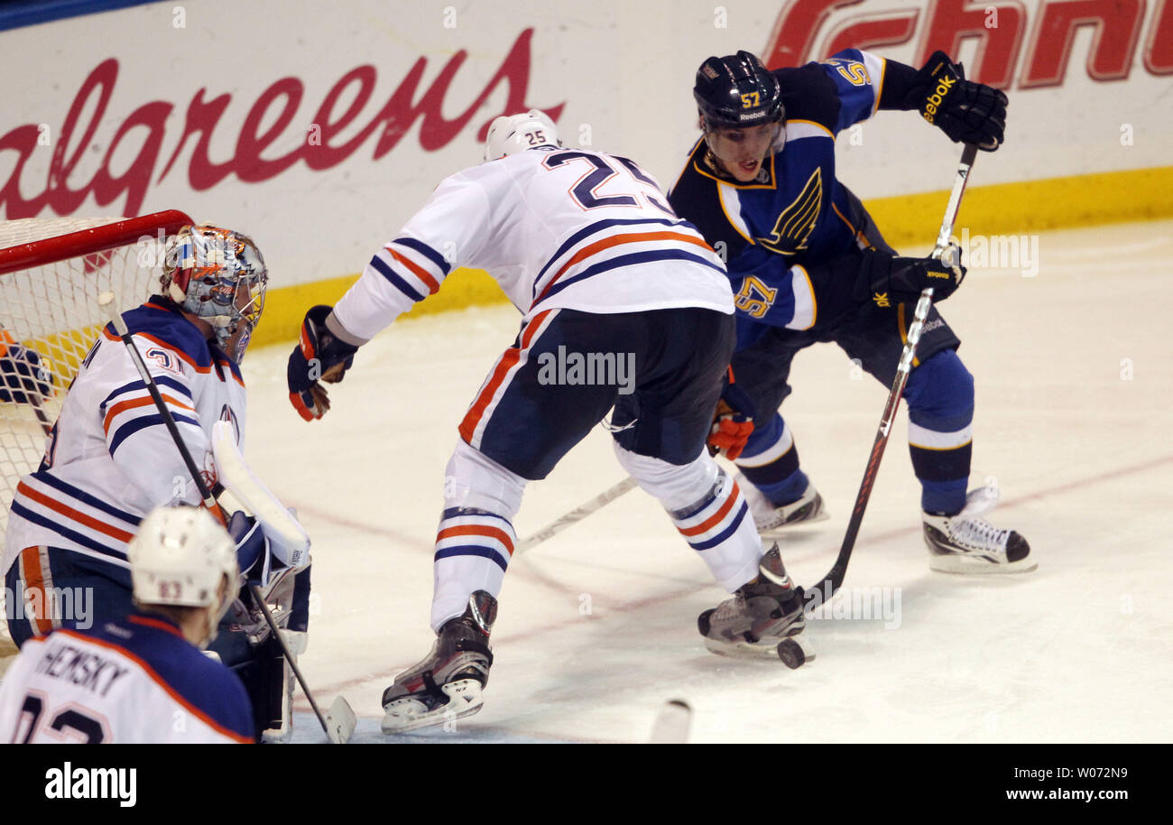 St. Louis Blues David Perron tries to put the puck past Edmonton Oilers ...