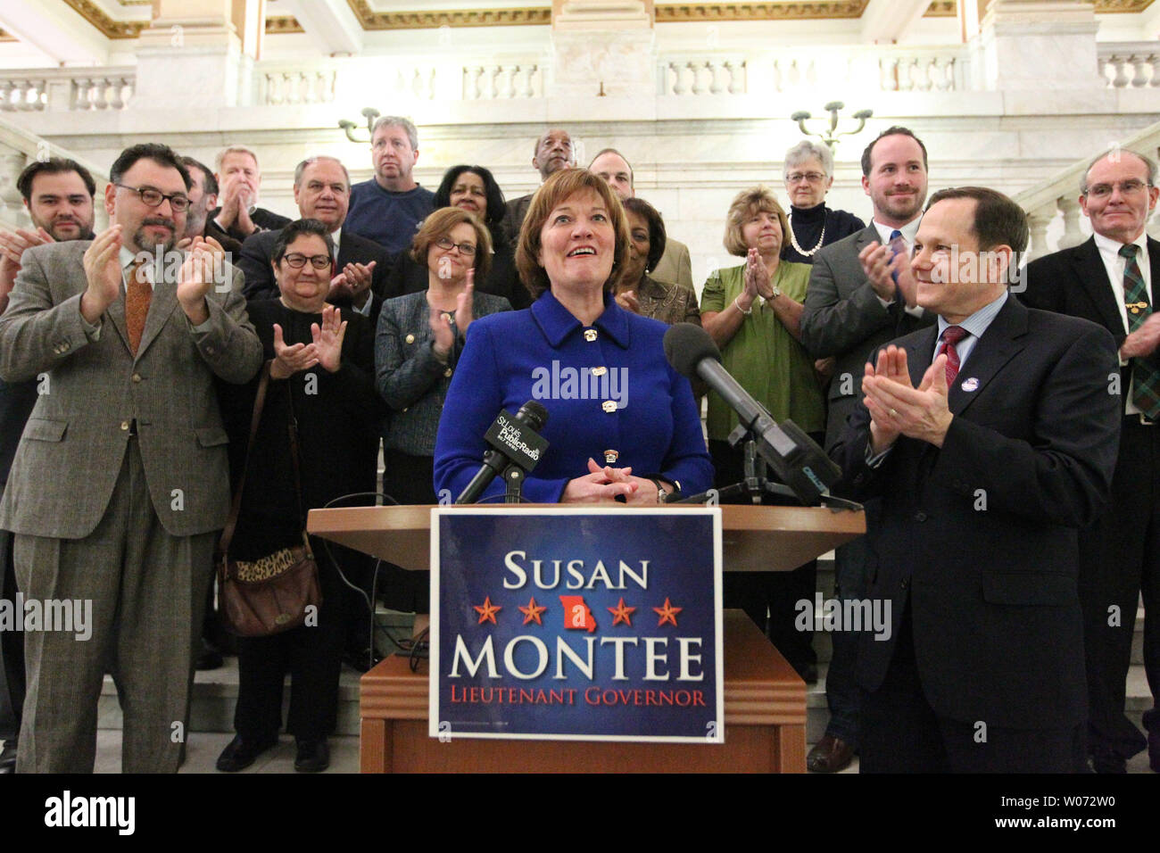 Former Missouri State Auditor Susan Montee is welcomed to the podium by St. Louis Mayor Francis Slay (R) and supporters at St. Louis City Hall, as she announces she will run for the office of Missouri Lieutenant Governor, in St. Louis on February 7, 2012. Montee, a democrate will face current Lt. Governor Peter Kinder, a republican. UPI/Bill Greenblatt Stock Photo