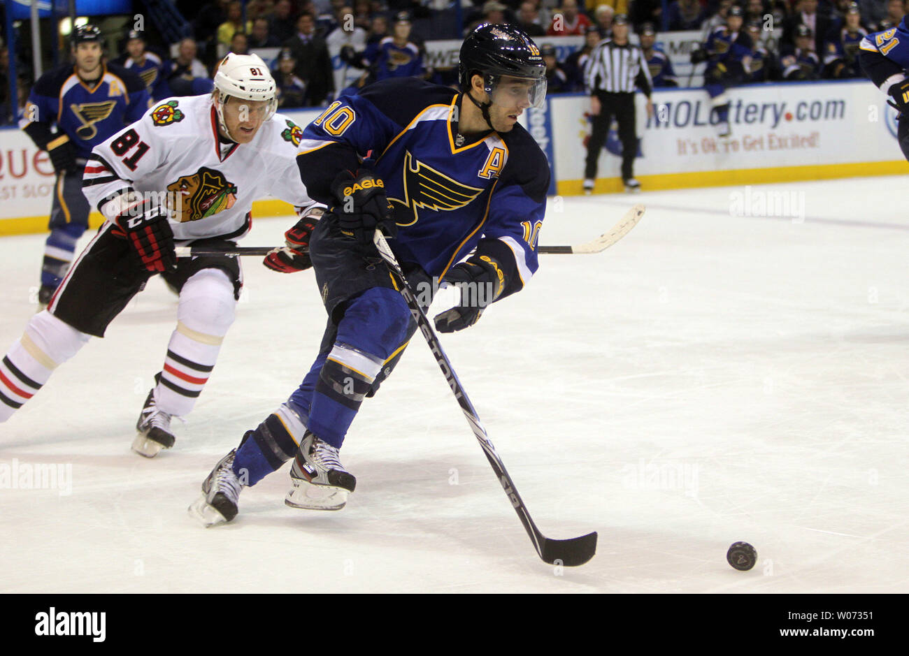 Chicago Blackhawks Marian Hossa (81) stays on the tail of St. Louis Blues Andy McDonald in the first period at the Scottrade Center in St. Louis on March 6, 2012.   UPI/Bill Greenblatt Stock Photo