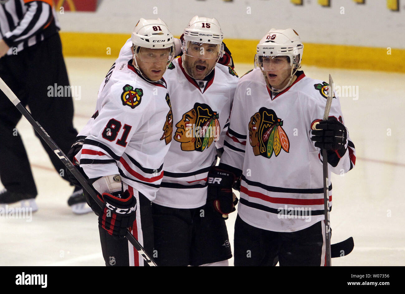 Chicago Blackhawks Marian Hossa (L) and Patrick Kane (R) celebrate with teammate Andrew Brunette after his third period goal against the St. Louis Blues at the Scottrade Center in St. Louis on March 6, 2012.  St. Louis won the game 5-1.  UPI/Bill Greenblatt Stock Photo